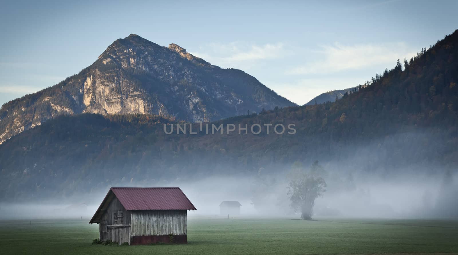 An image of a beautiful landscape with fog in bavaria germany