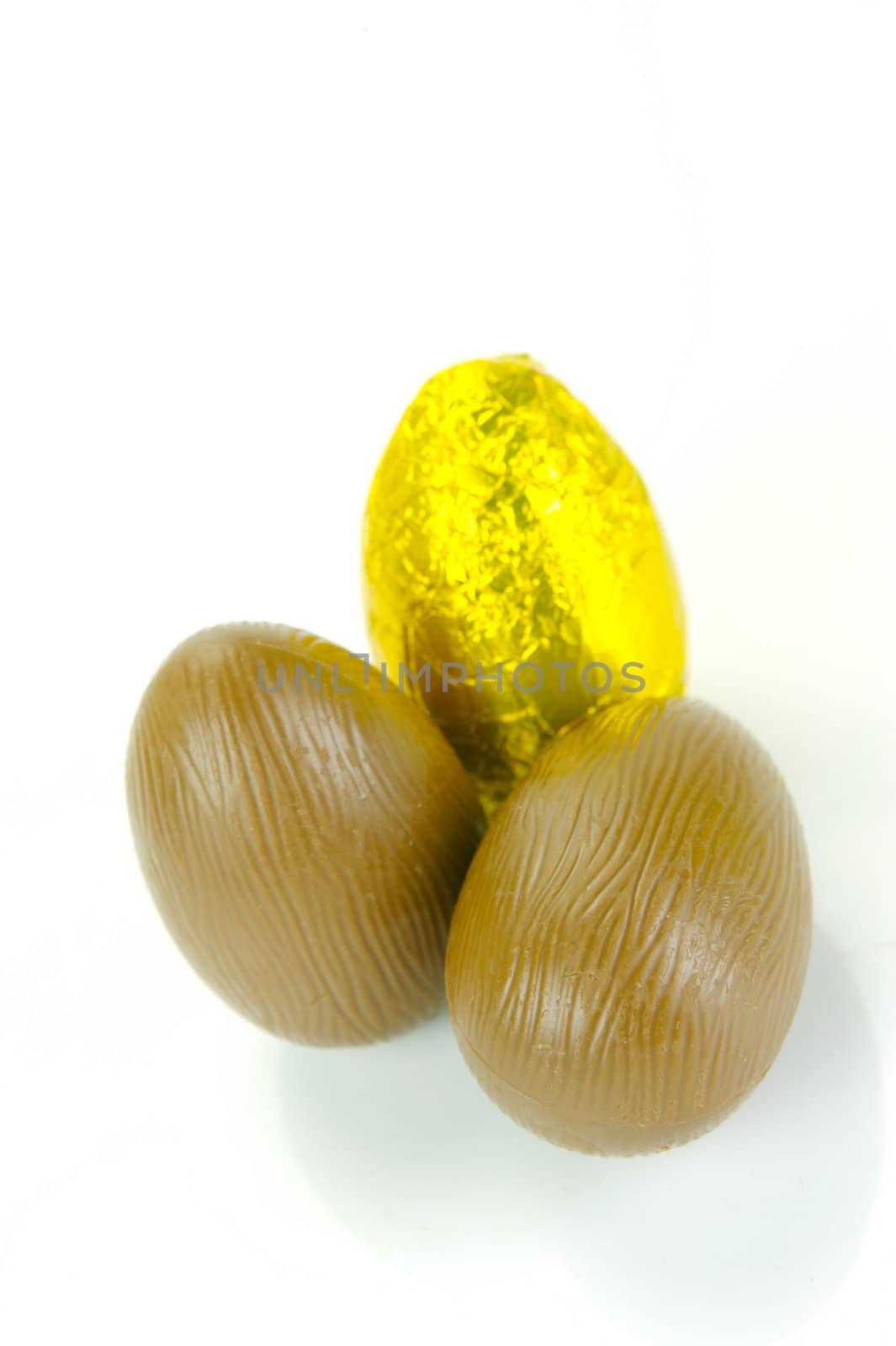 Chocolate easter eggs isolated against a white background