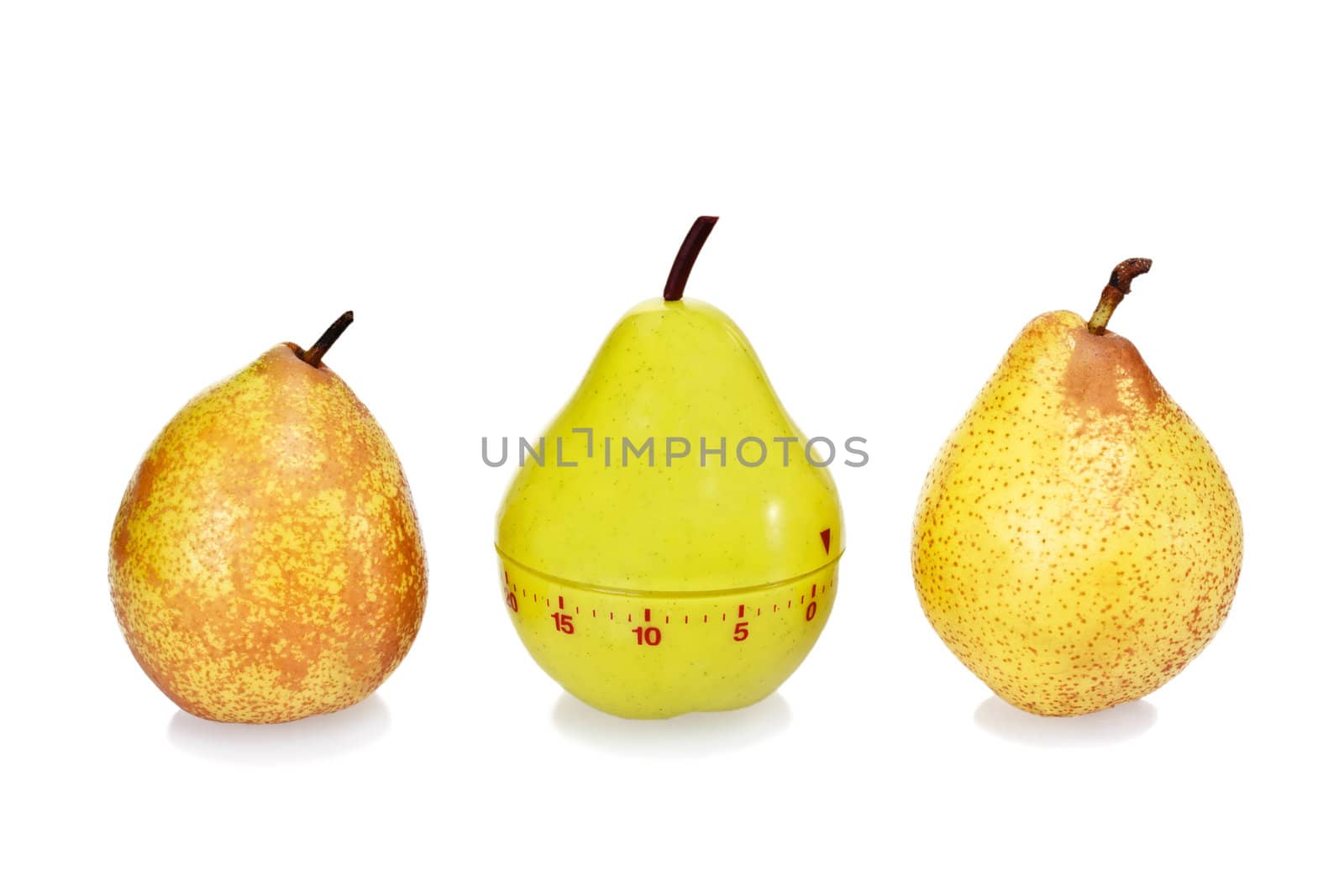 Two ripe fresh pears and plastic pear timer (stand out of the crowd concept)