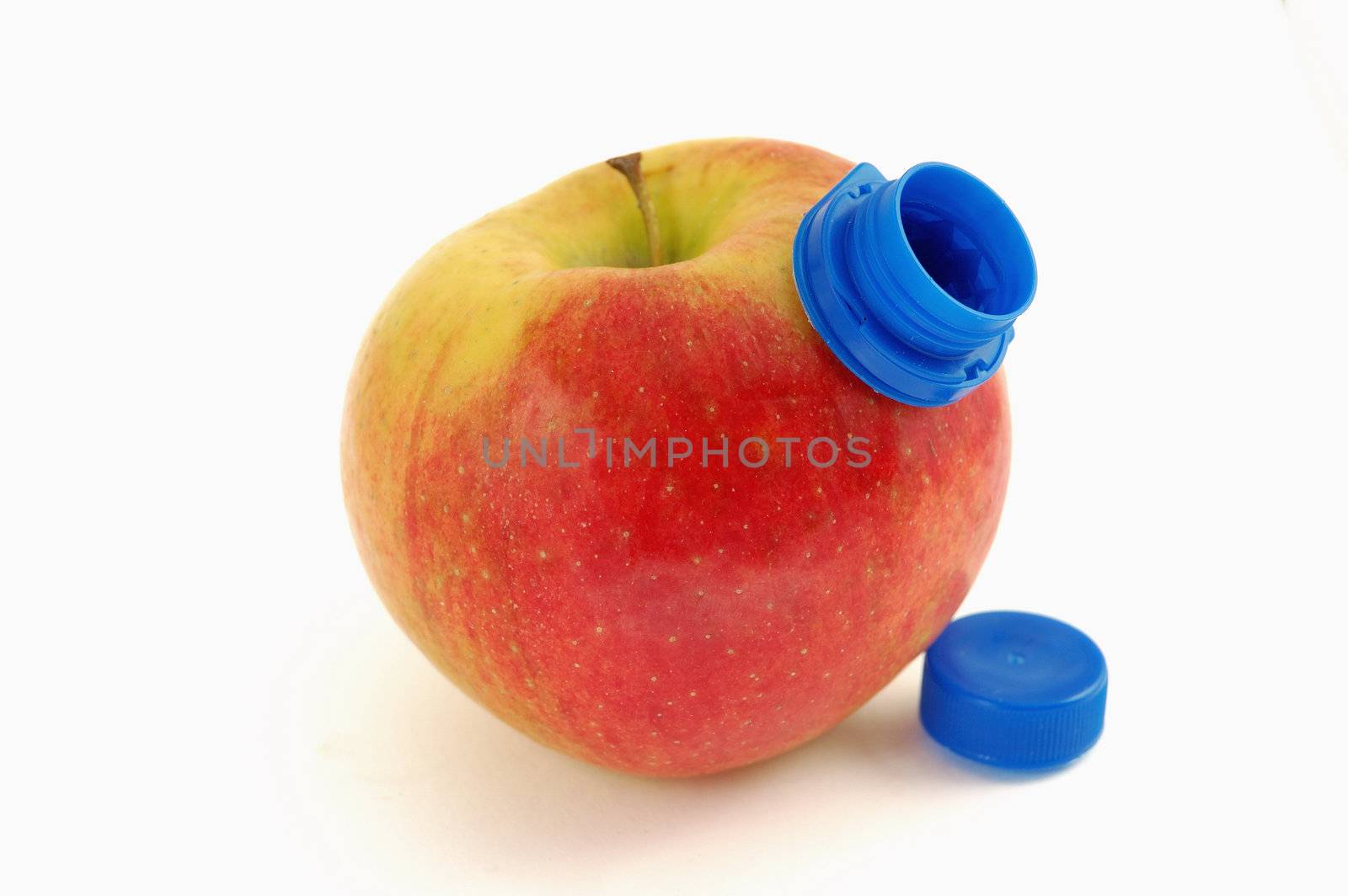 Drinking apple juice concept : red apple with plastic cork over white background.