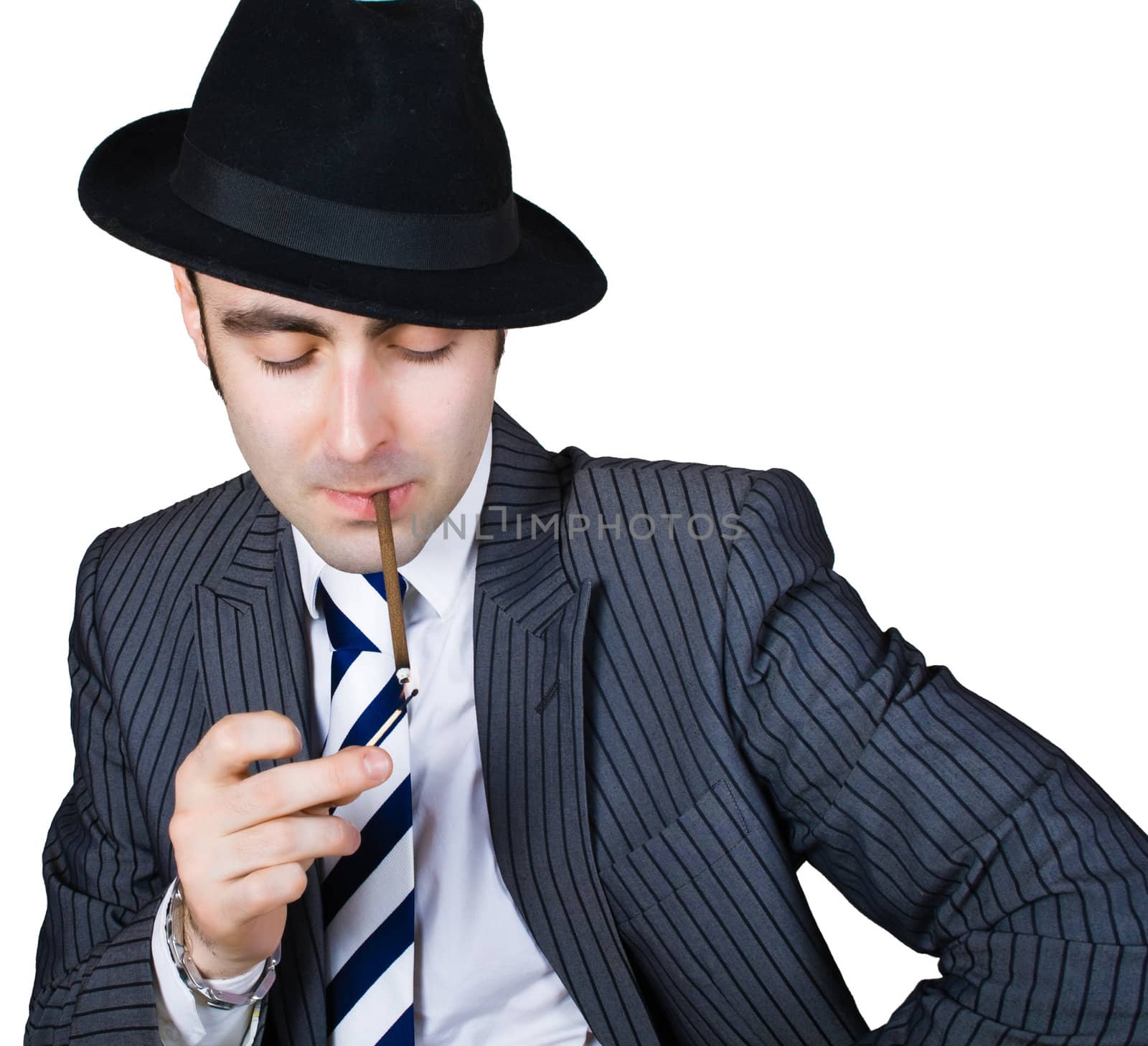  retro businessman light a cigarette isolated over white with clipping path