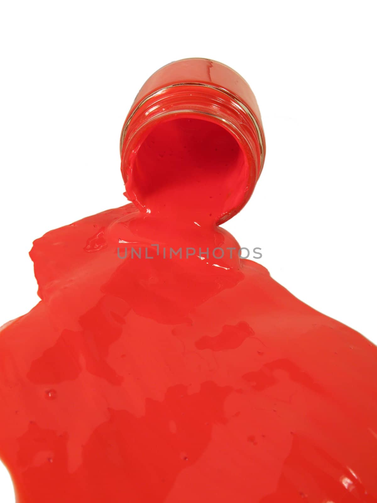 Orange paint from a glass can, isolated on white.