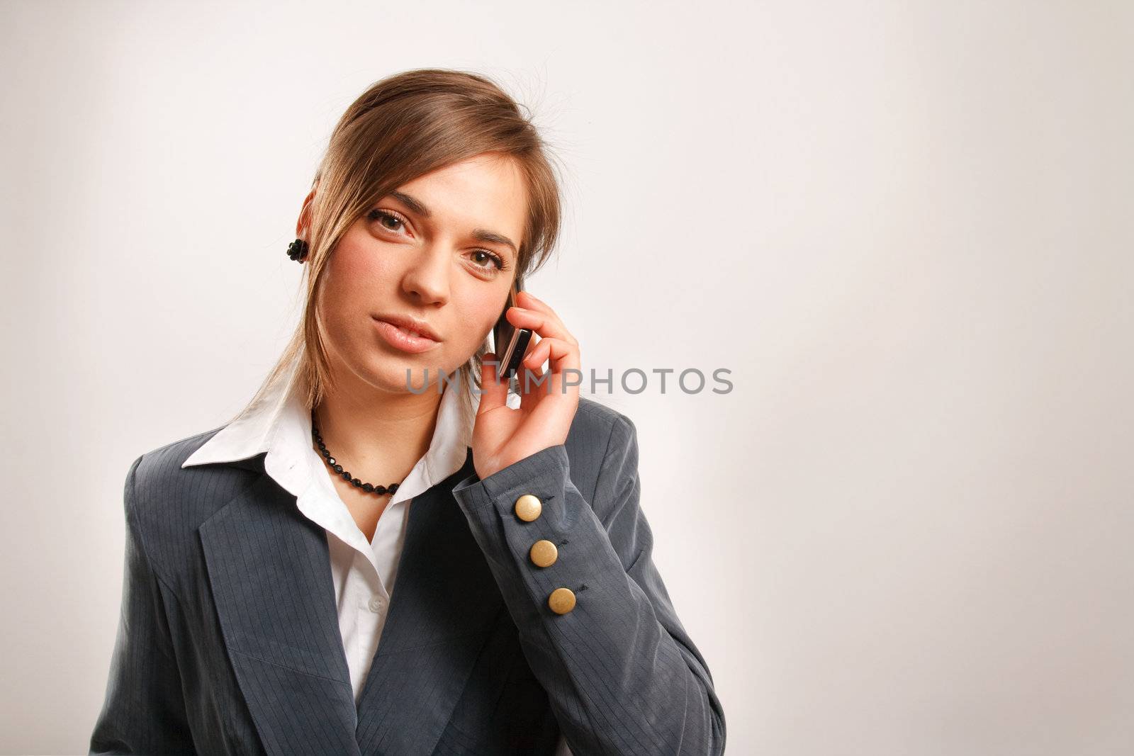 Business woman talking on the phone.