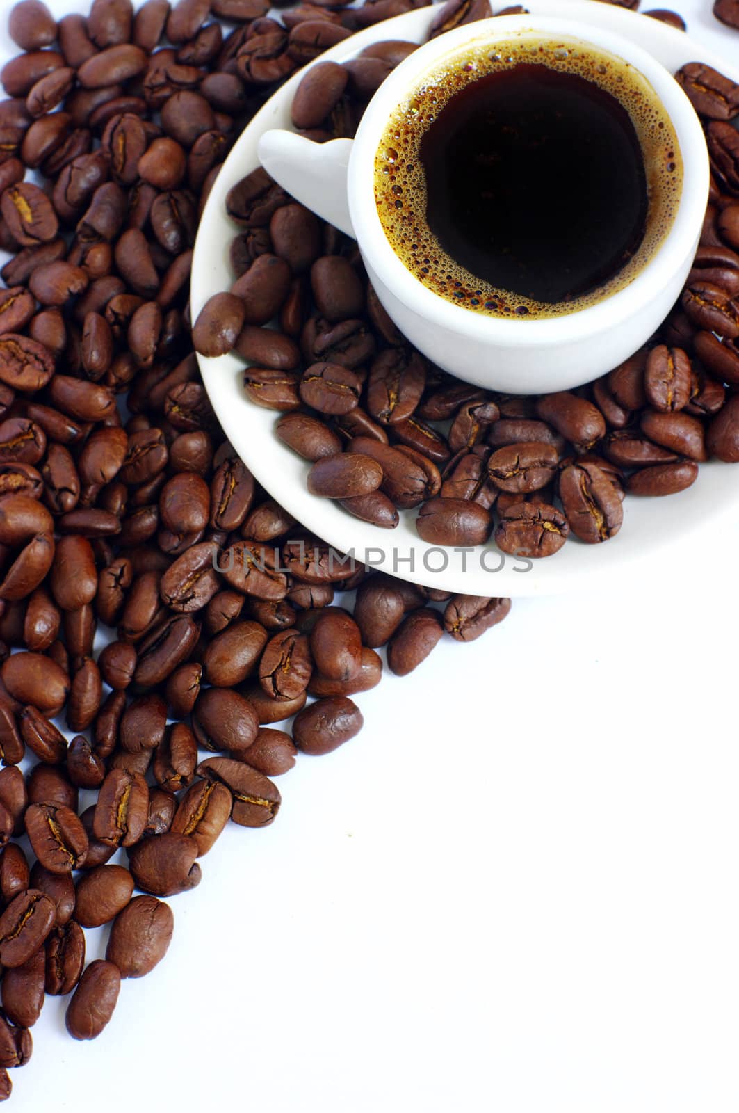 Coffee cup and grain on white