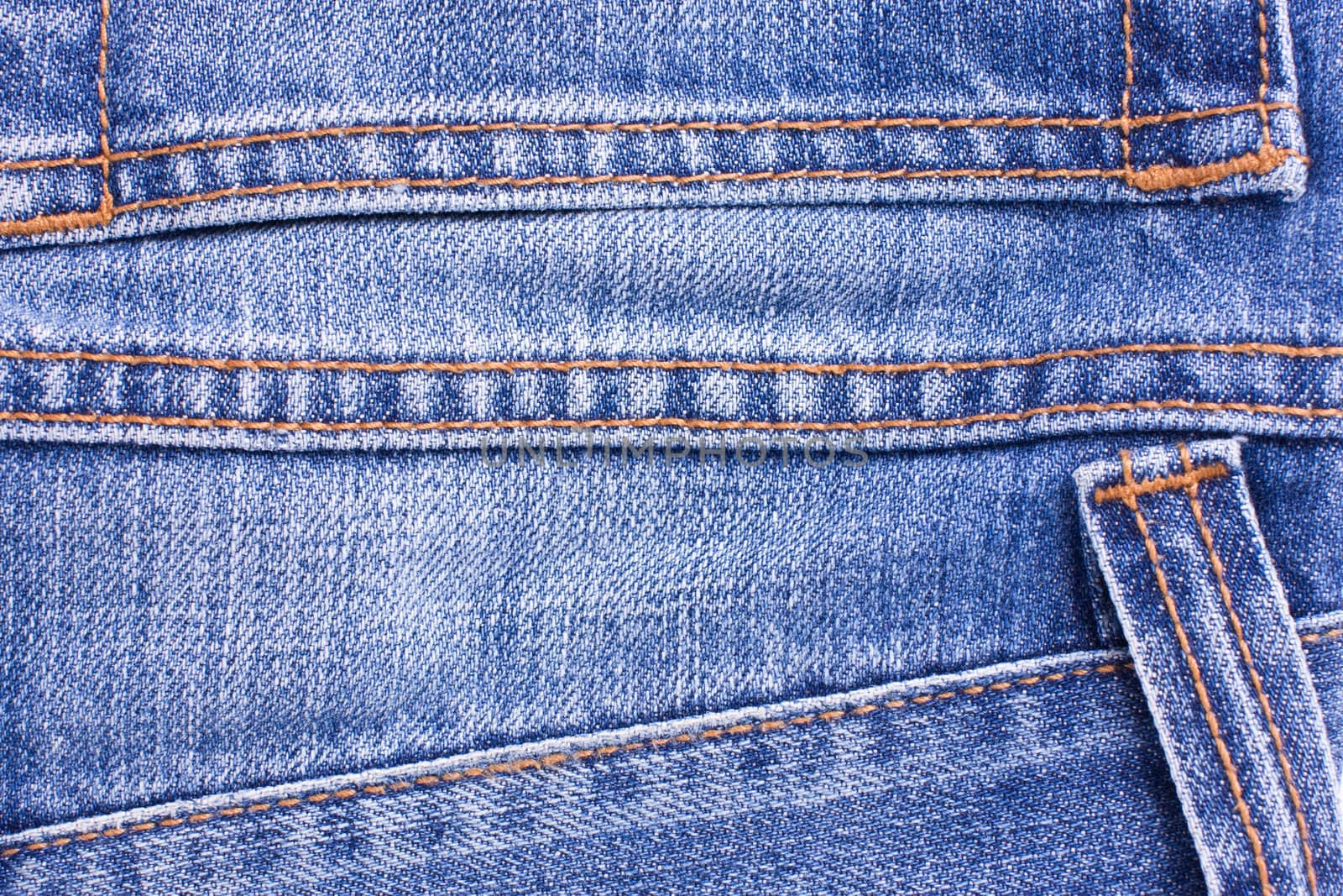Blue Jeans Background with Seams Close-up