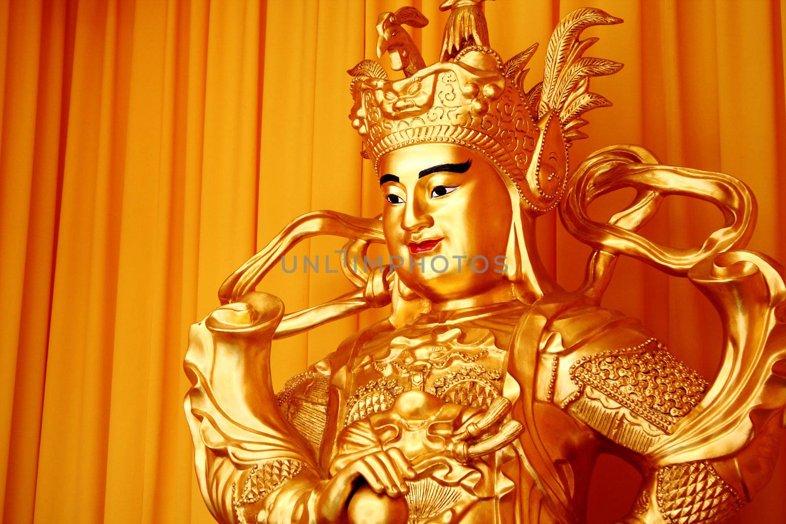 tradition chinese male buddha with gold toned