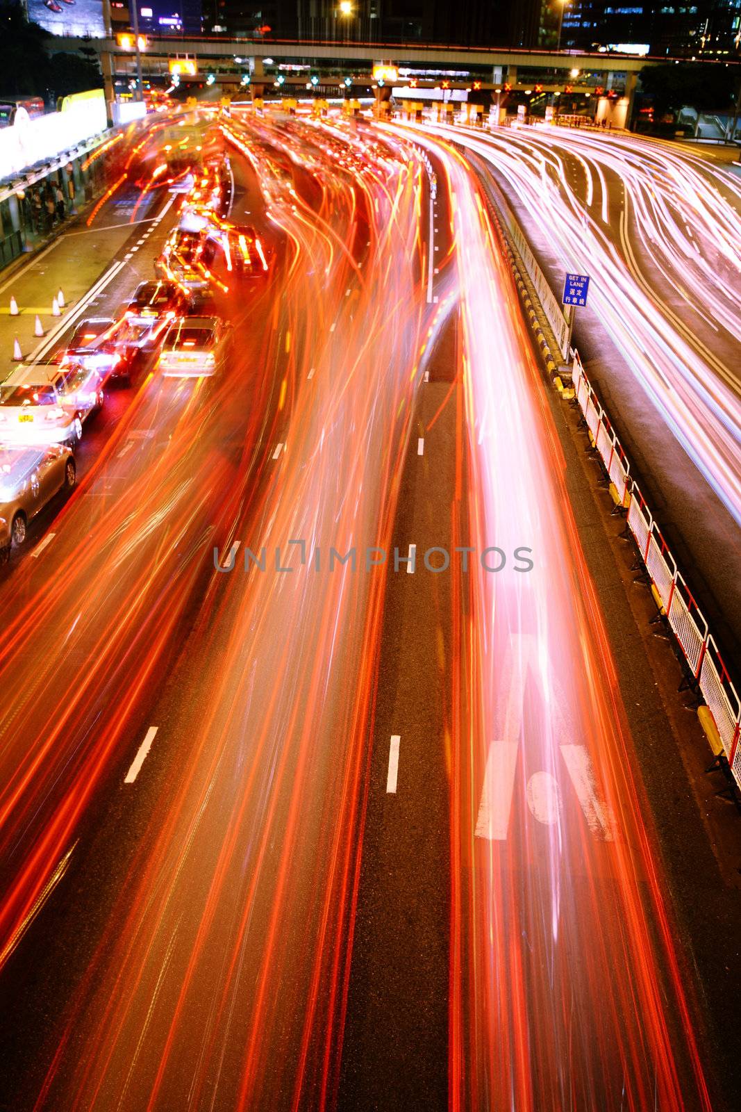 hong kong traffic night in downtown tunnel