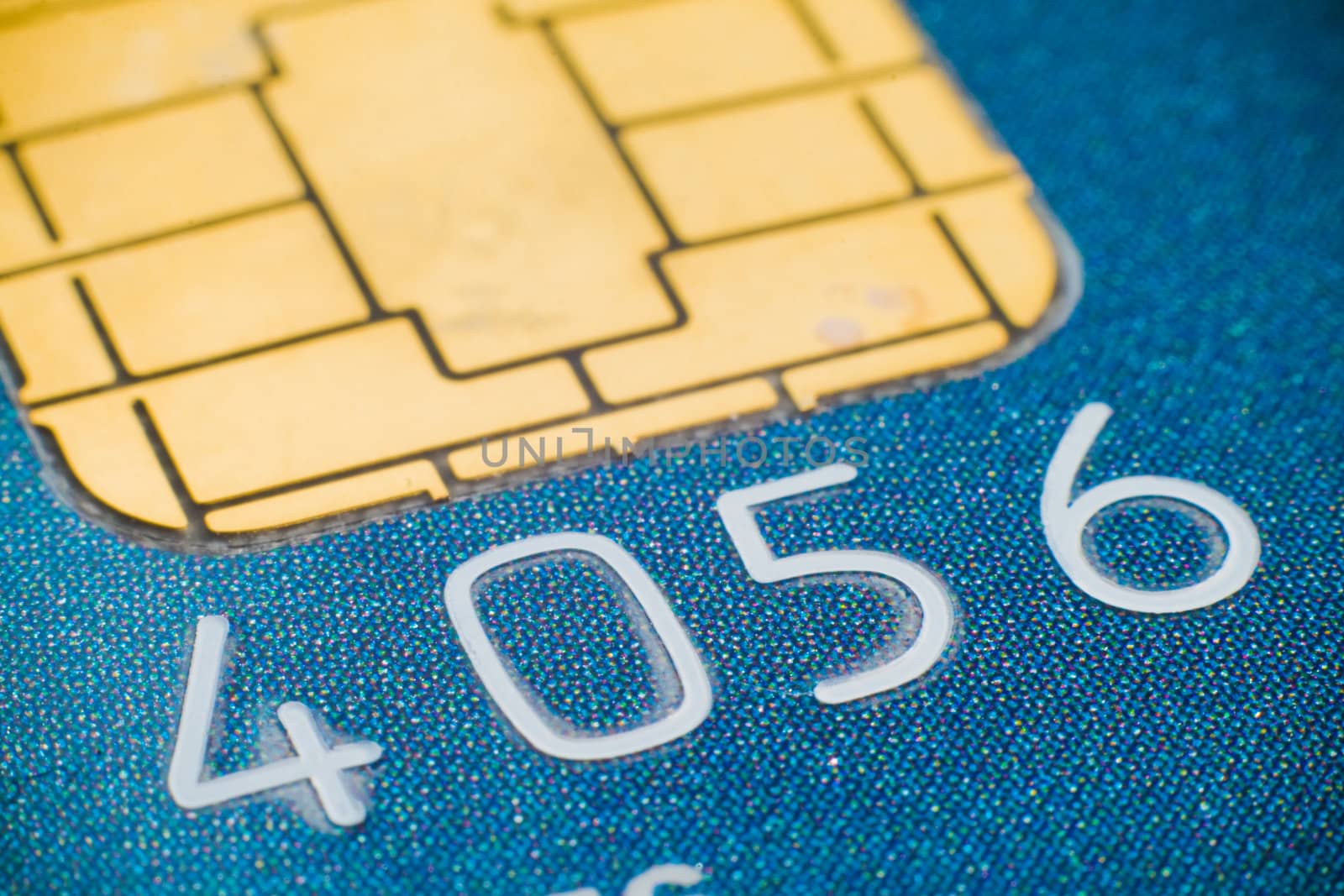 Macro close-up of plastic credit card micro chip
