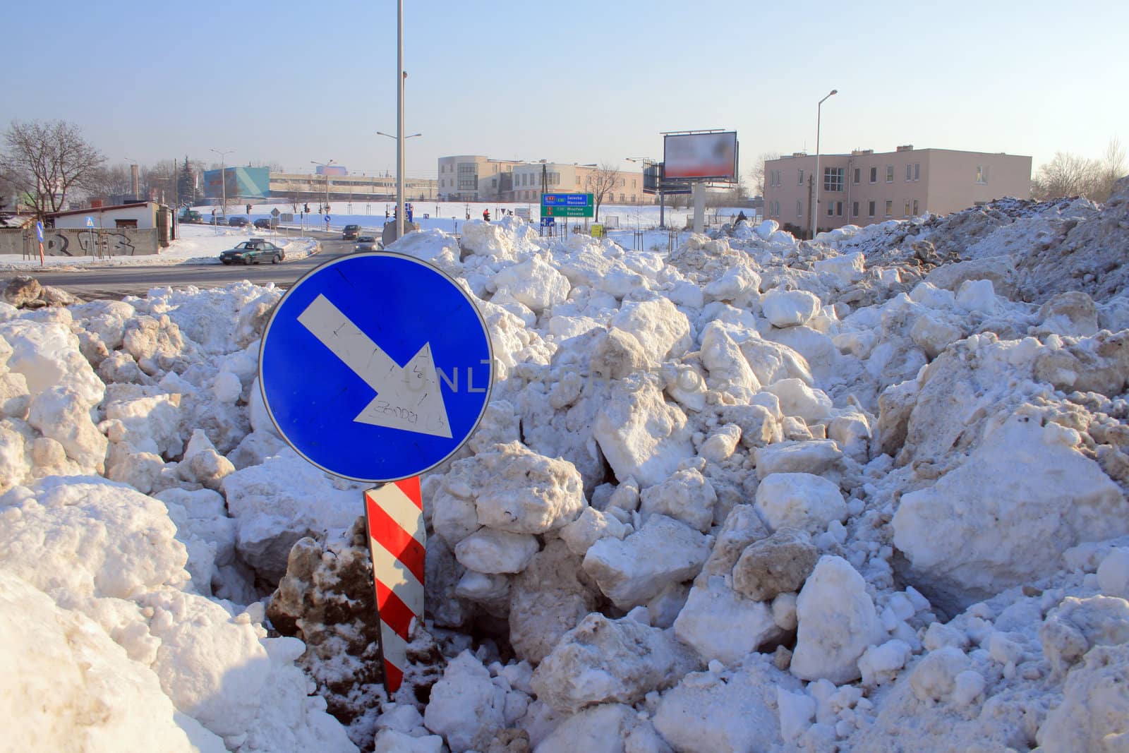 Heap of crushed snow collected from the town center