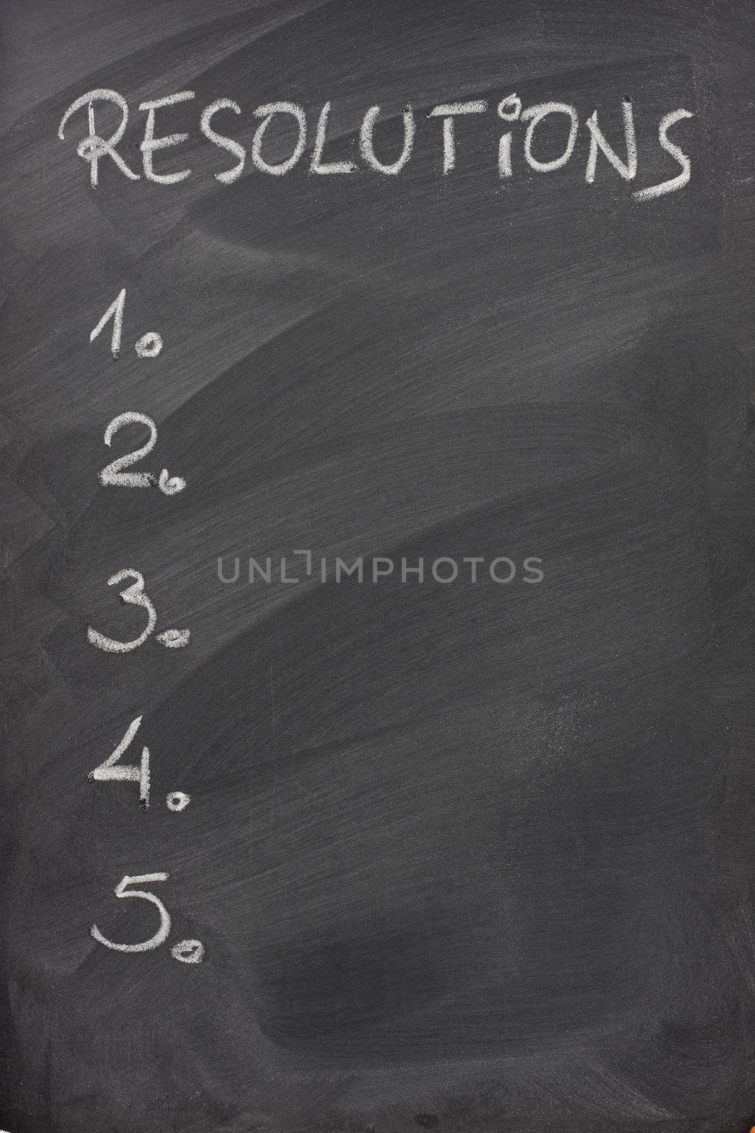 list of resolutions on a blackboard by PixelsAway