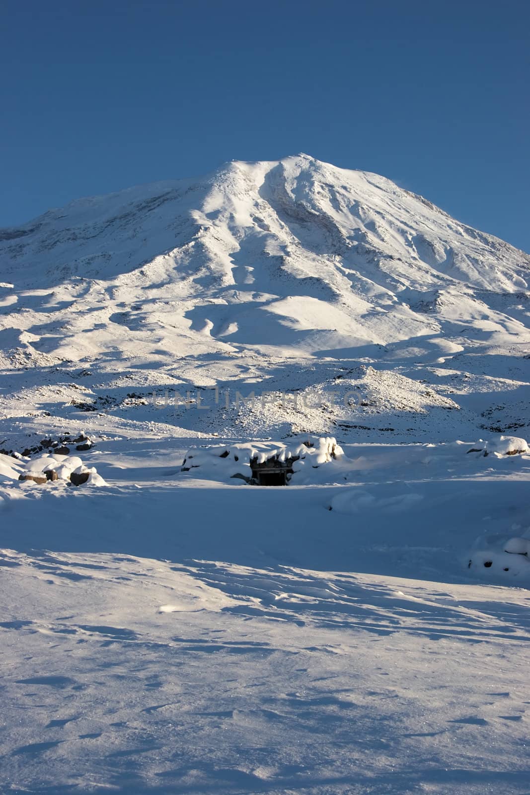 Mount Ararat (Agri Dagi) in winter. Photo was shot from abandoned Elikoy village, altitude 2250m. Mount Ararat is an inactive volcano located near Iranian and Armenian borders and the tallest peak in Turkey.