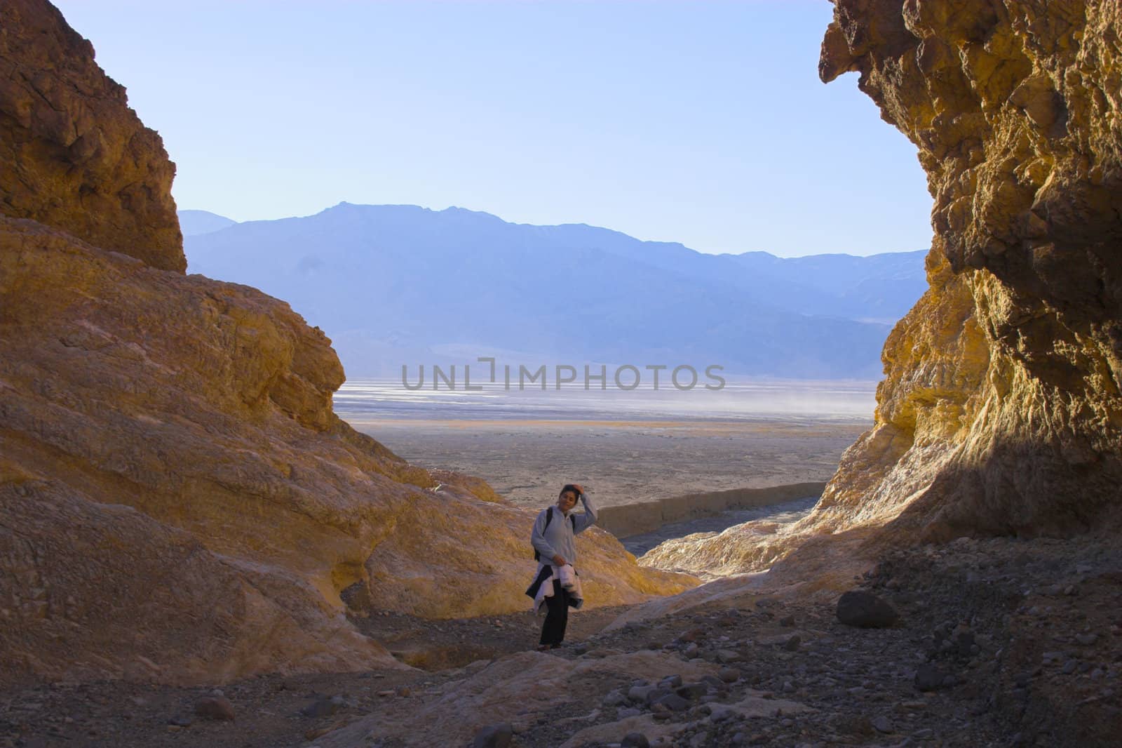 Purple, yellow, and blue clay and salt mineral deposits in geological formations of Death Valley National Park