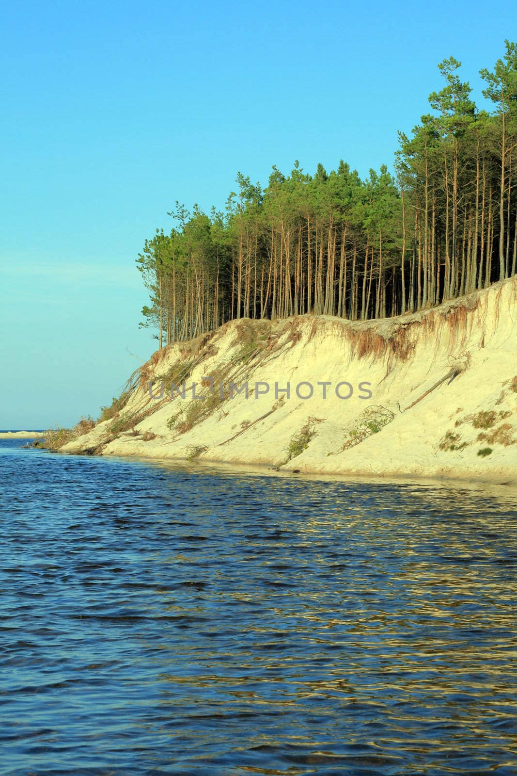 River and a cliff on the seashore