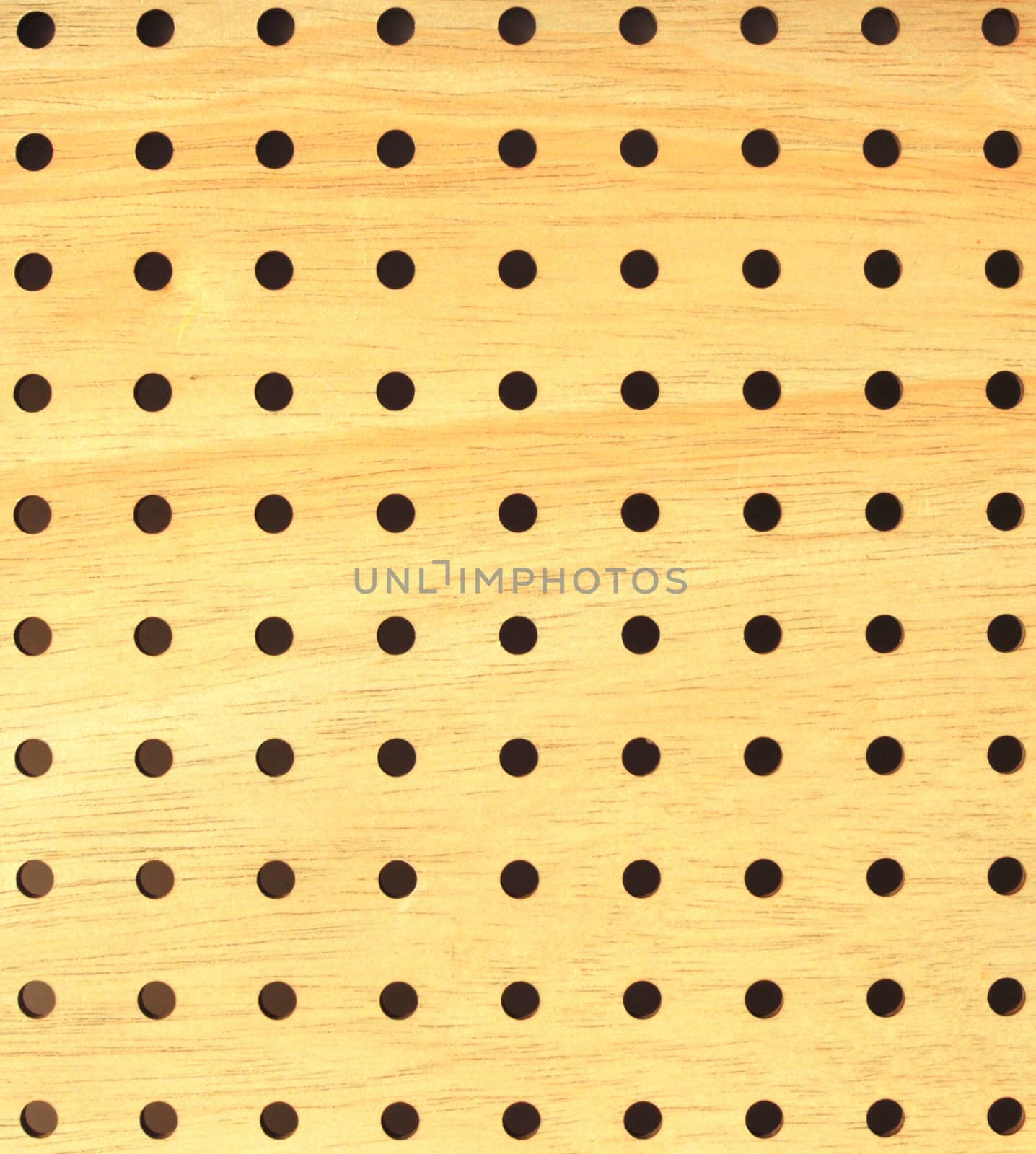 wooden board with apertures on white background