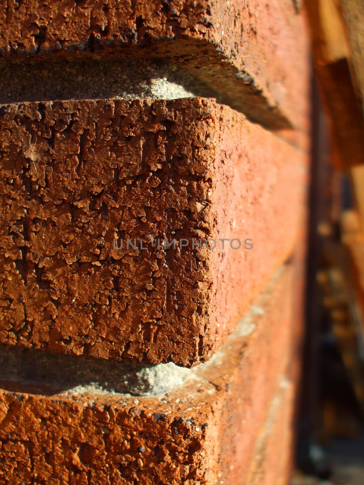 Corner of a brick building close up.