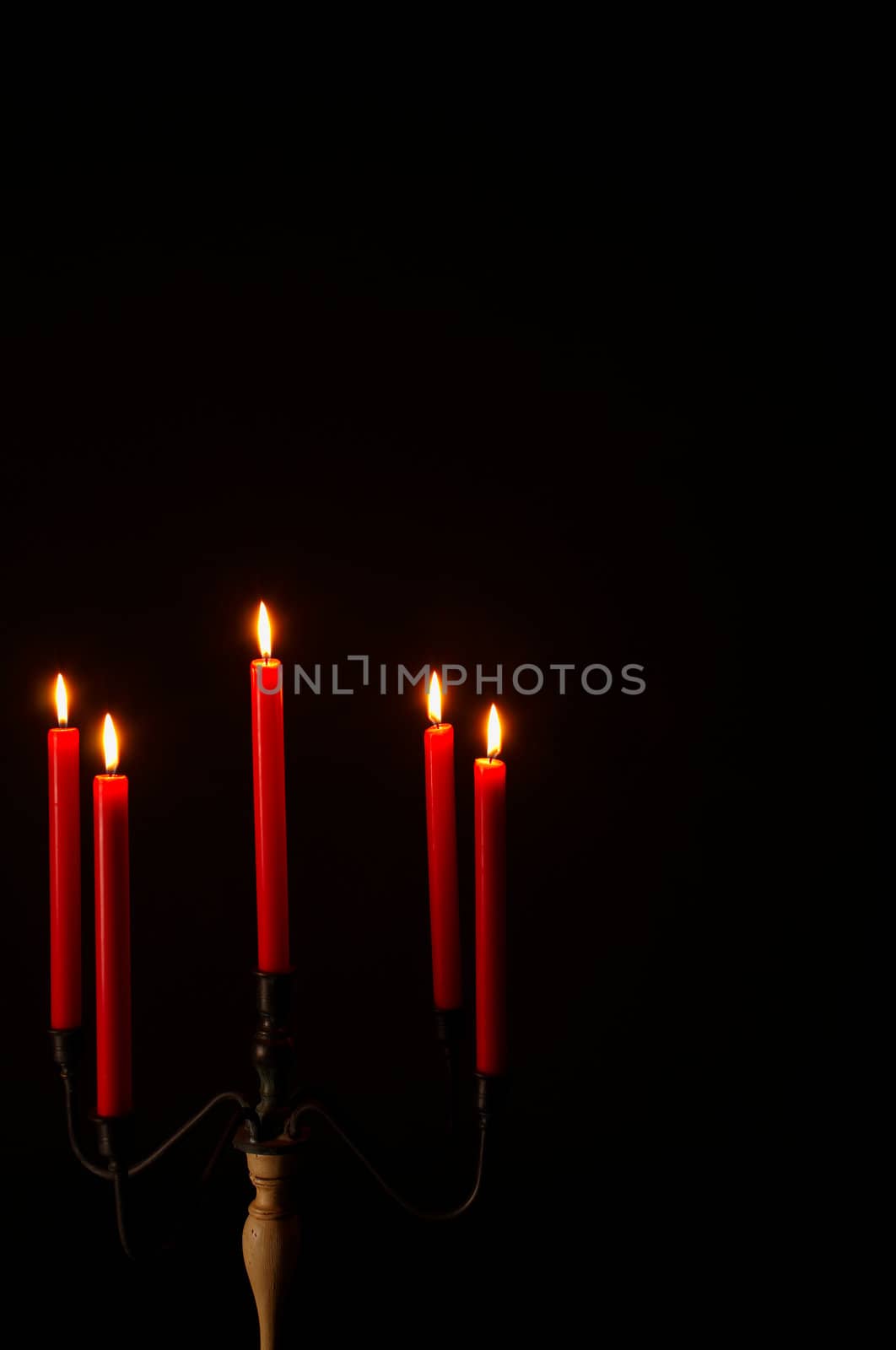 Five armed candlestick, romantic atmosphere on black with copy space