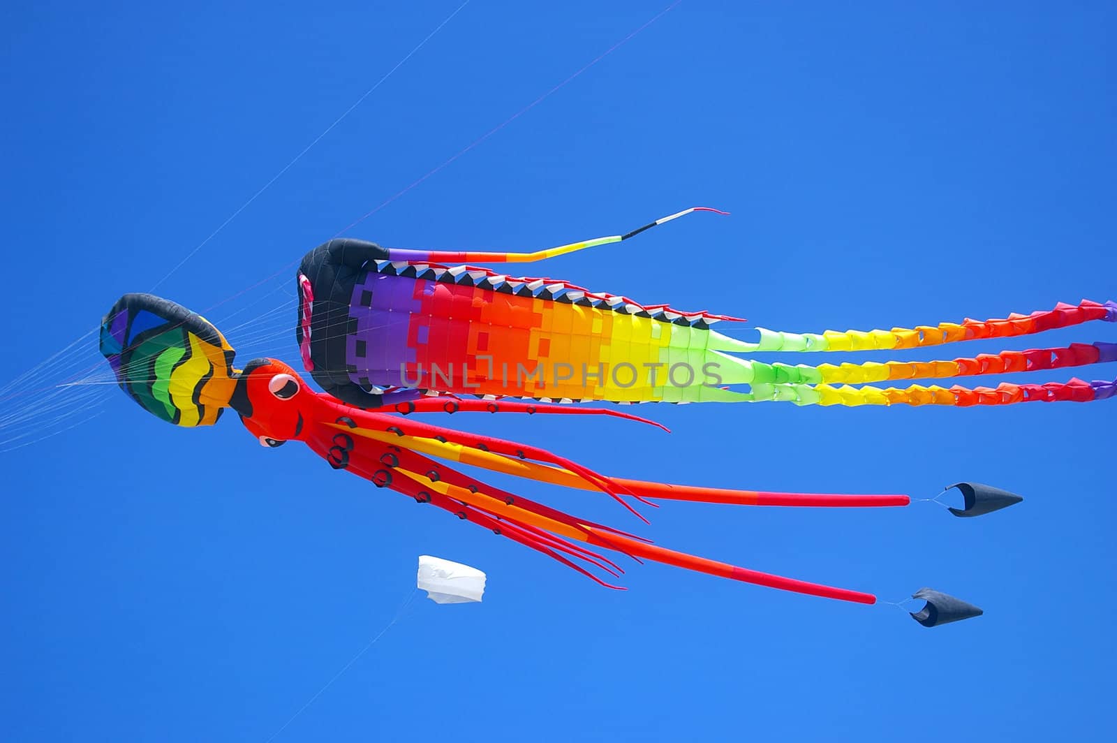 Colorful kites being flown at the Sanur beach games, Sanur, Bali, Indonesia.