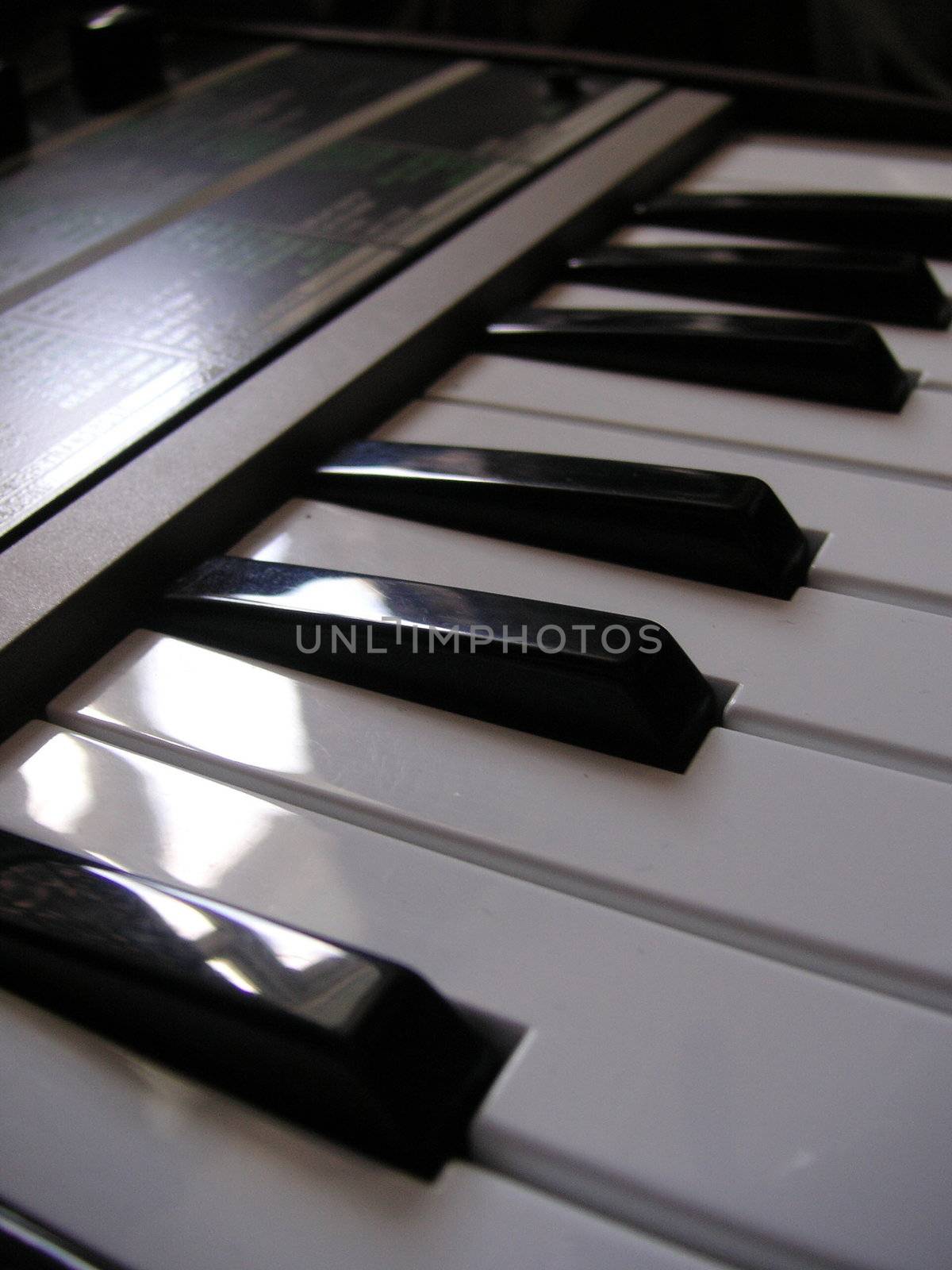 keys taken closeup of a keyboard synthesizer
