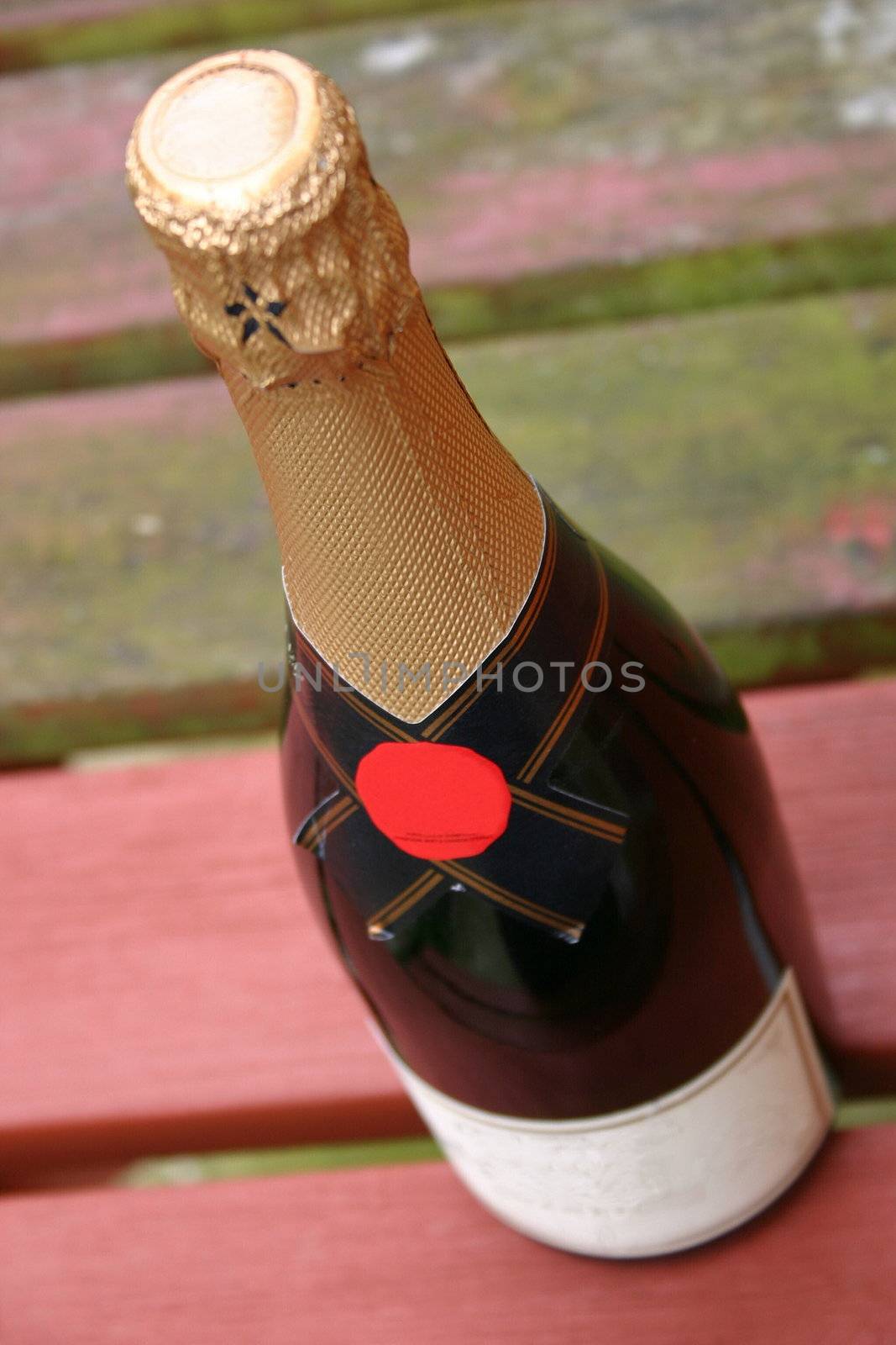 bottle of champagne on a wooden table