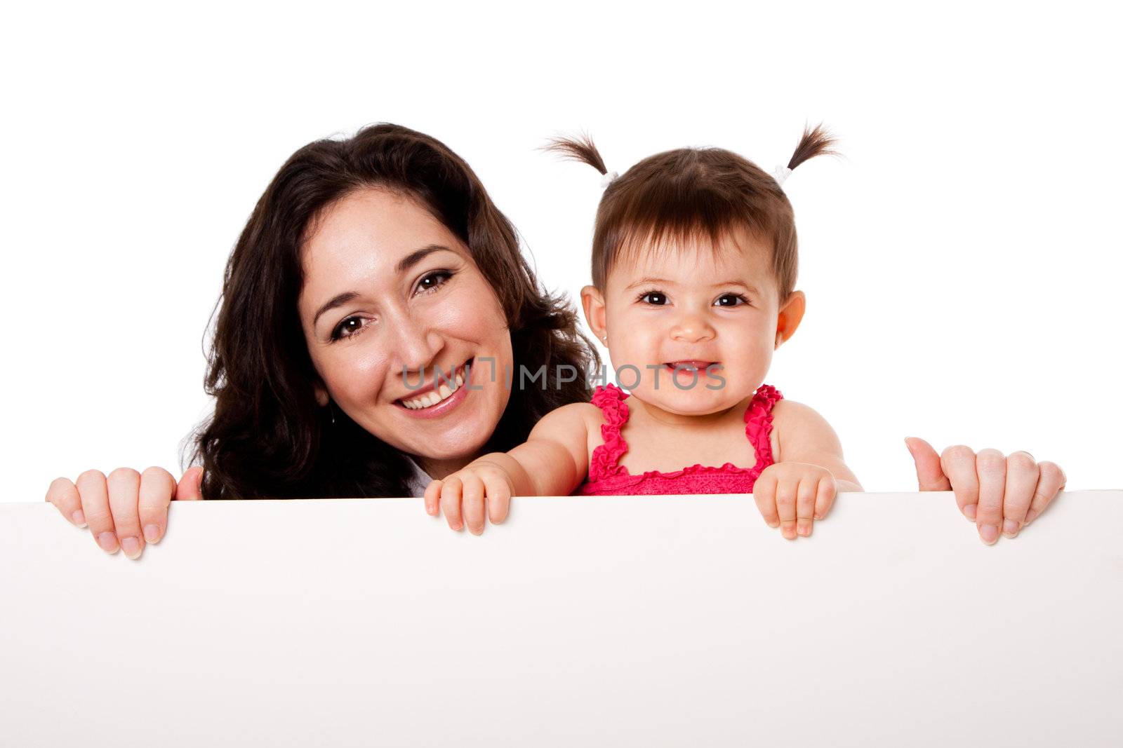 Beautiful happy family mother and teething baby daughter holding white board, isolated.