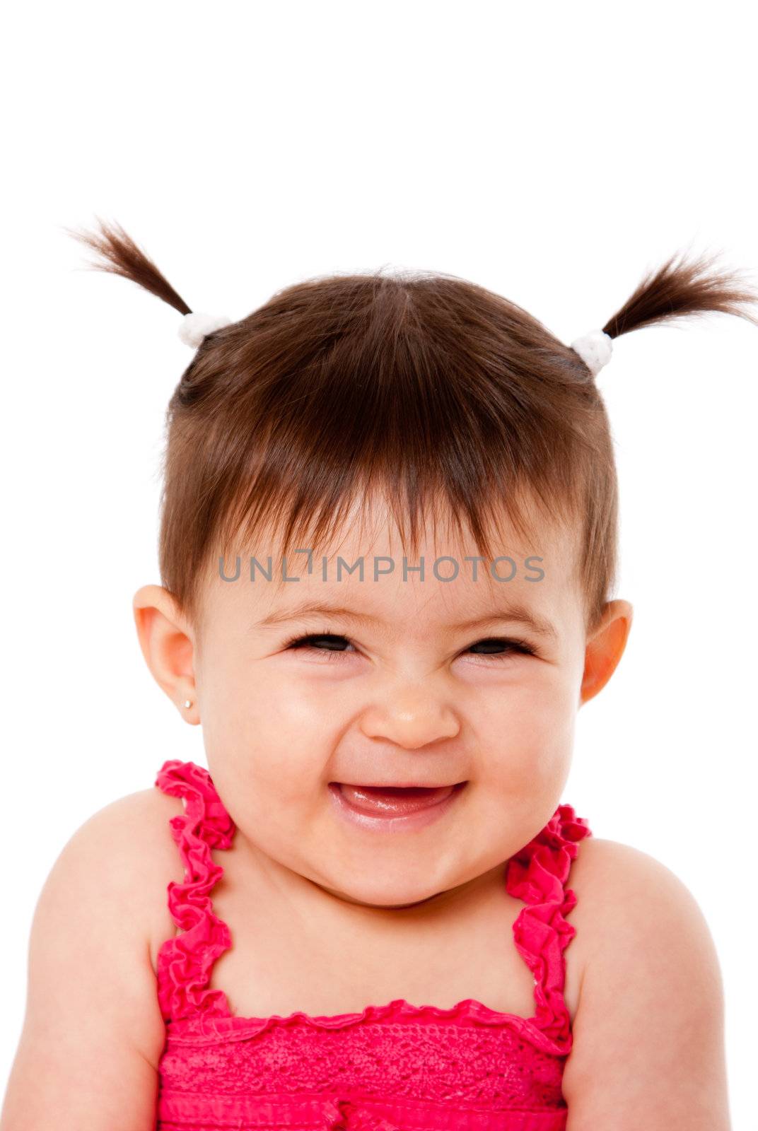 Face of cute happy smiling laughing baby infant girl with ponytails giggling, isolated.