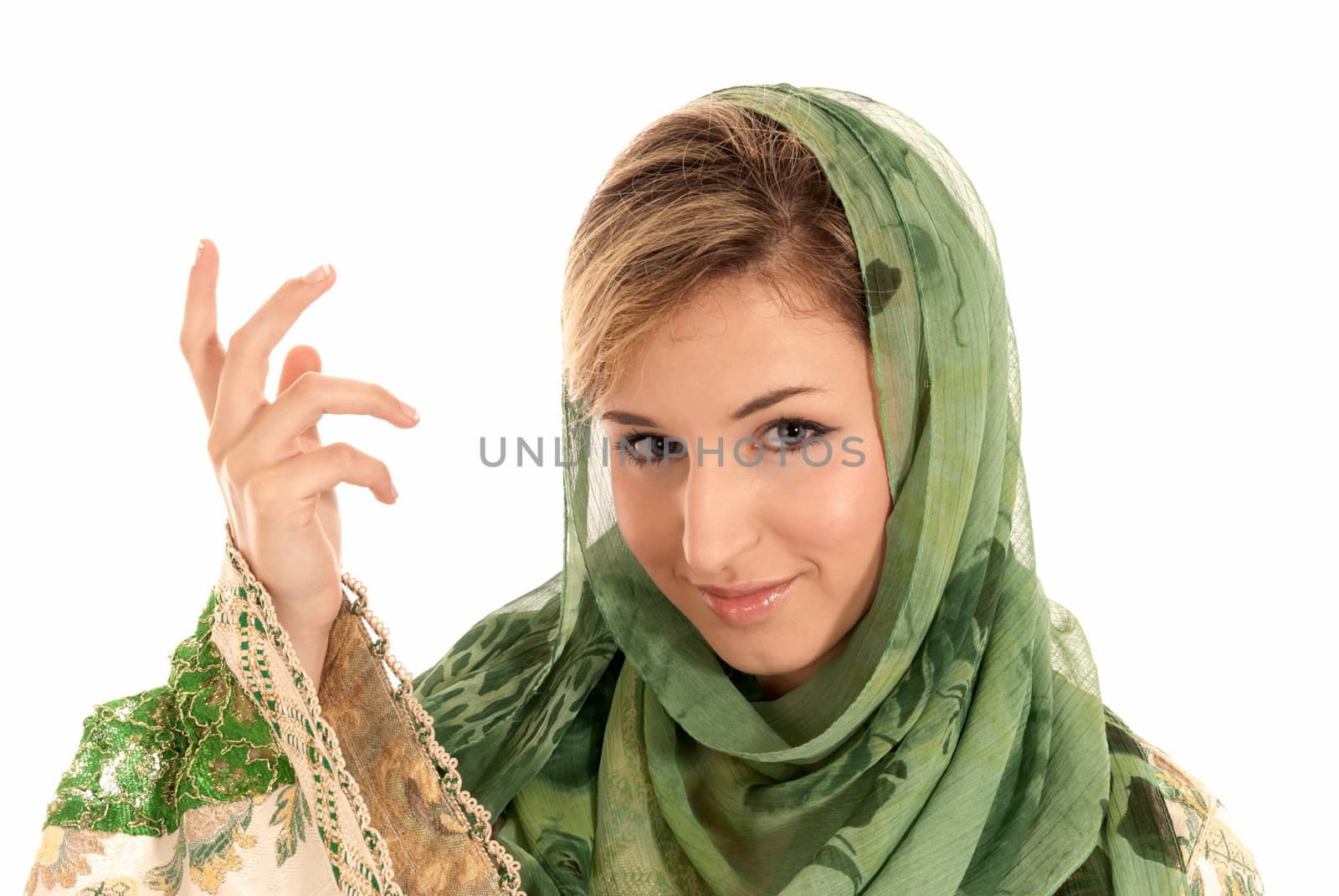 Young arab woman with veil closeup portrait isolated on white background by dgmata