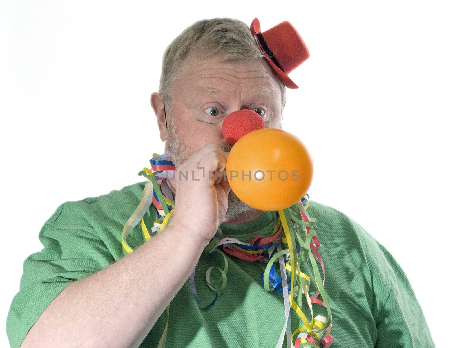 Clown with red hat, false nose and balloon