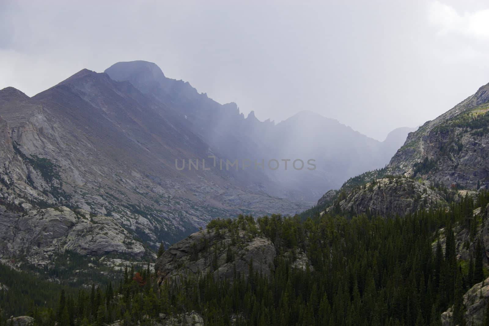 Rain and thunderclouds in the mountains tundtra prairies forests of Cordeliers 