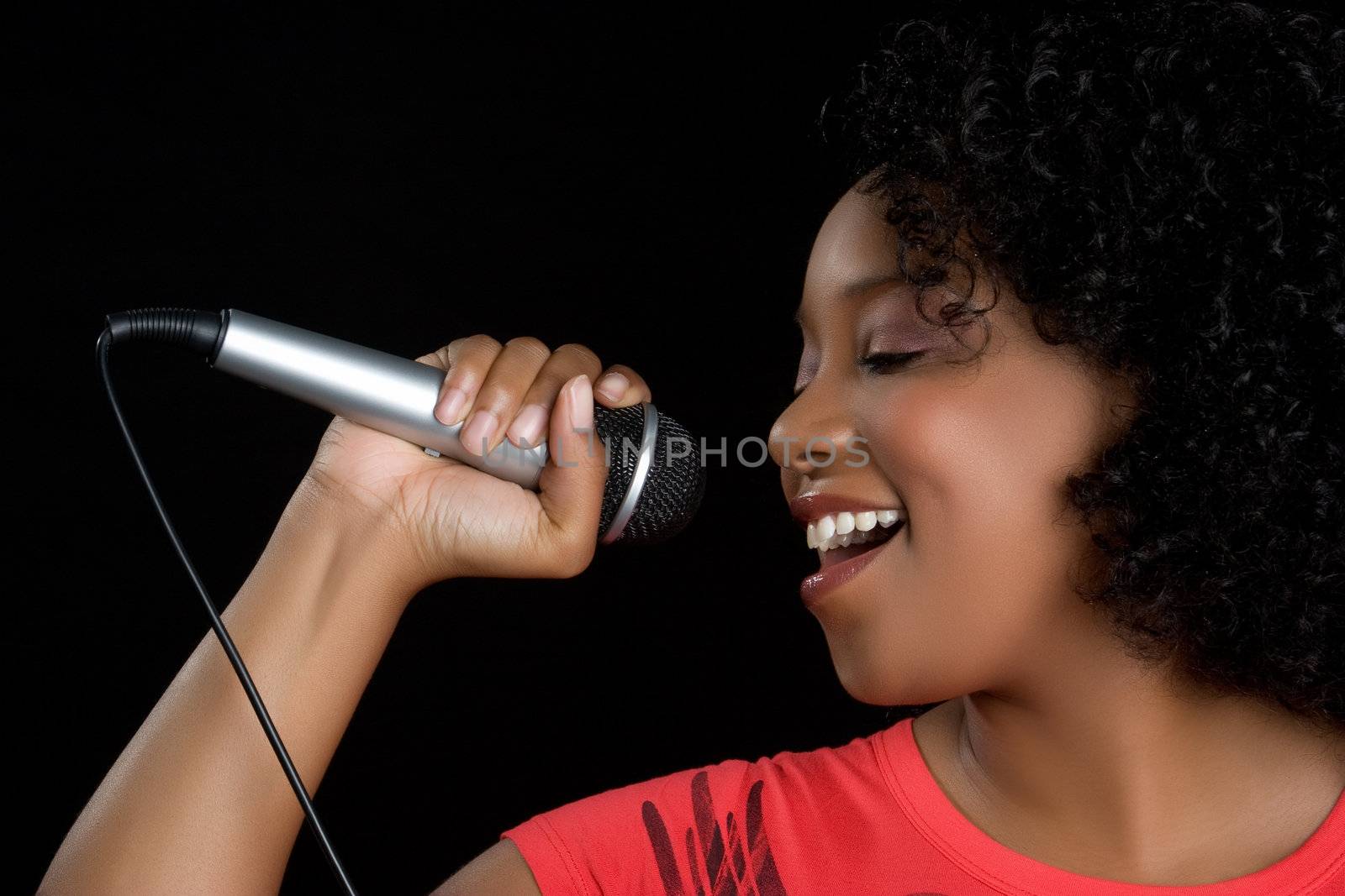Beautiful black microphone singer woman