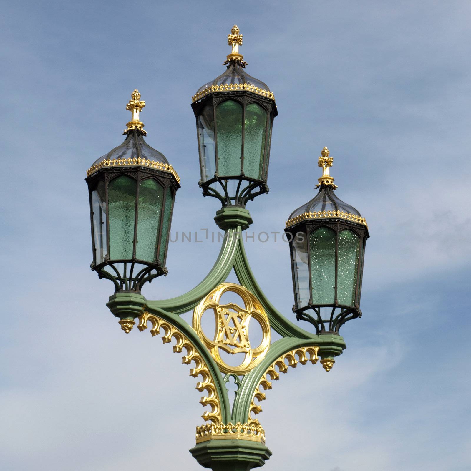 Old chandelier street light over blue sky