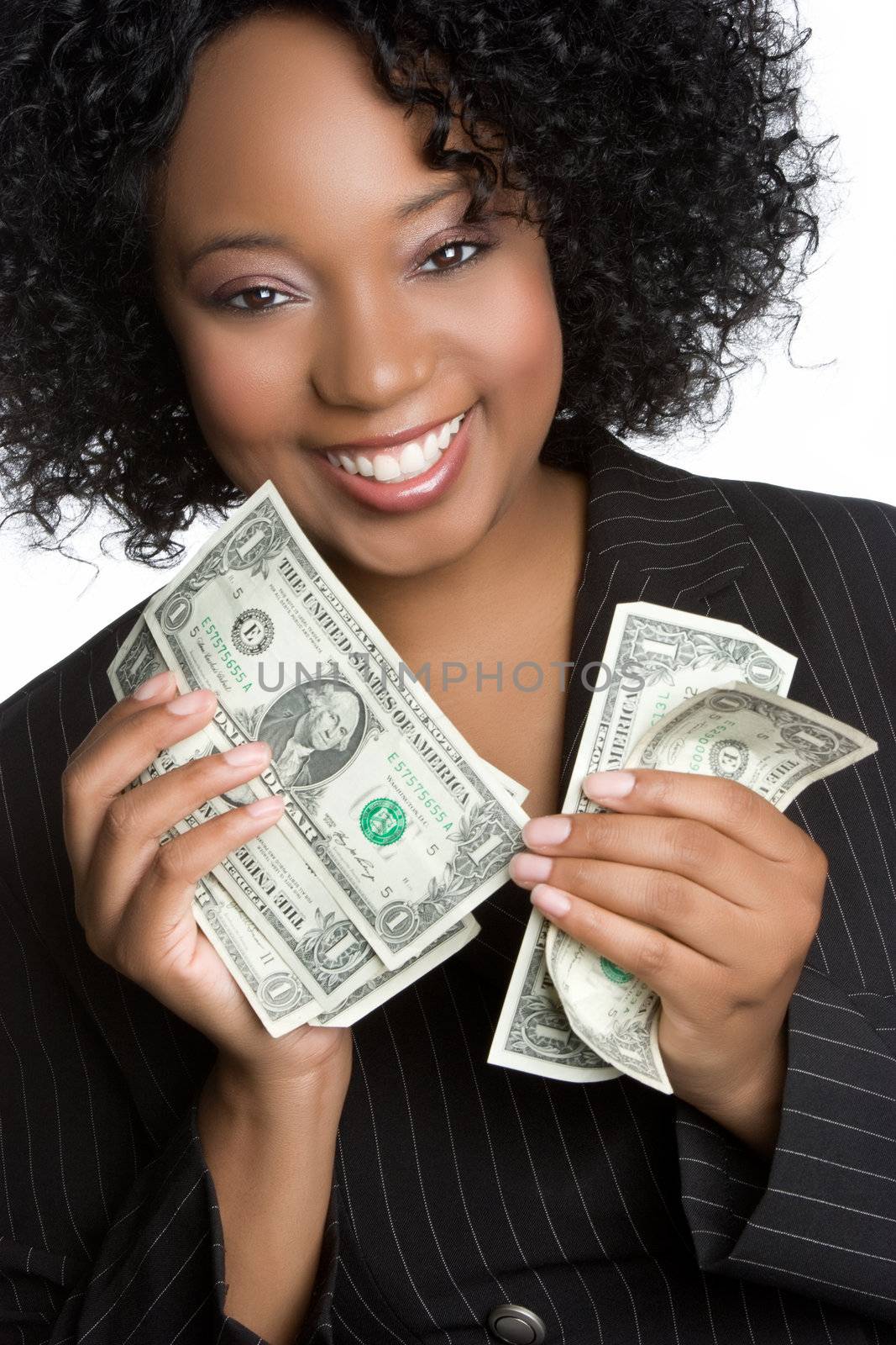 Smiling black woman holding money