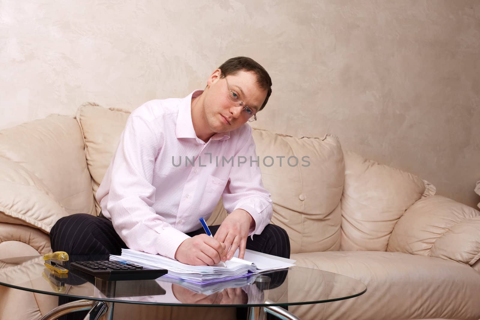 people series: young serious man sign document