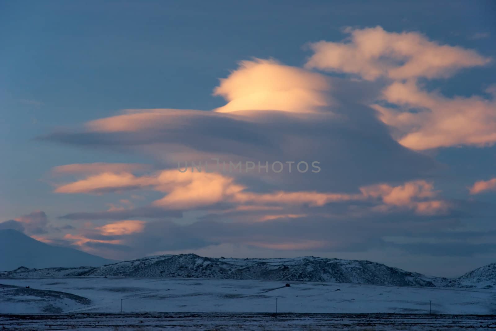 Winter sunset shot from the valley to the south of Ararat. Mount Ararat (Agri Dagi) is an inactive volcano located near Iranian and Armenian borders and the tallest peak in Turkey.