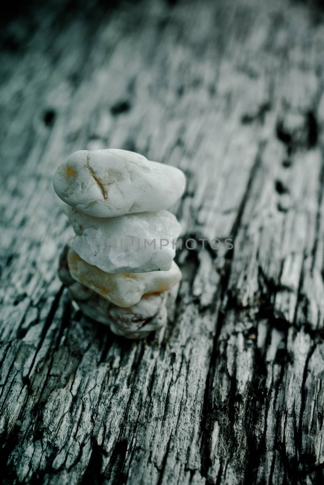 composition of small white rocks on an old lod