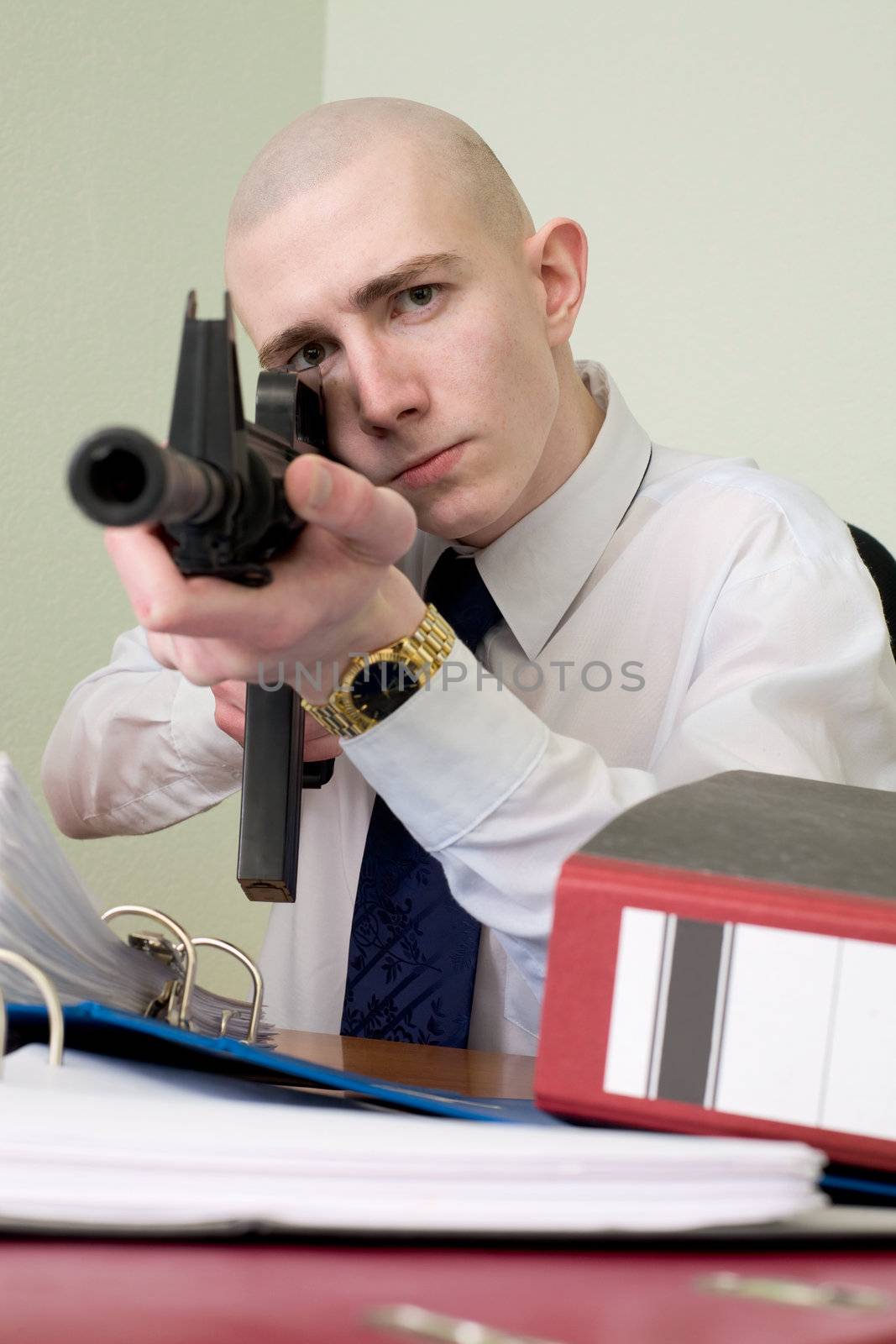 The chief accountant armed with a rifle
