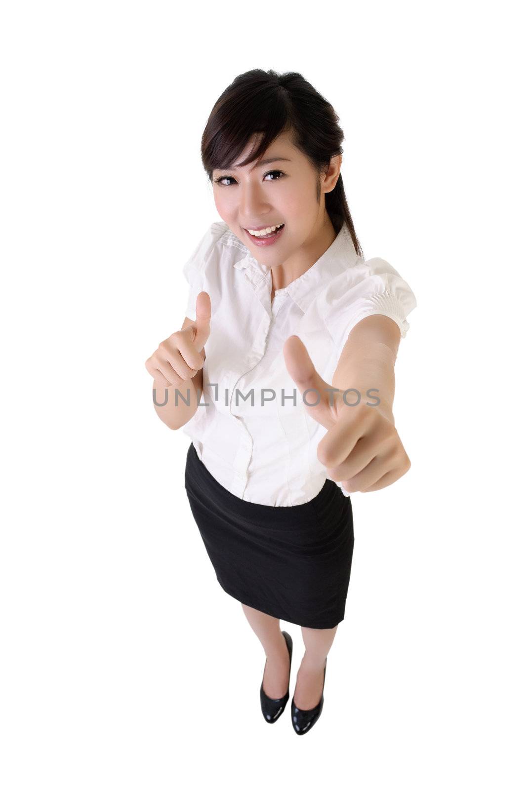 Happy business woman give you double excellent gesture.