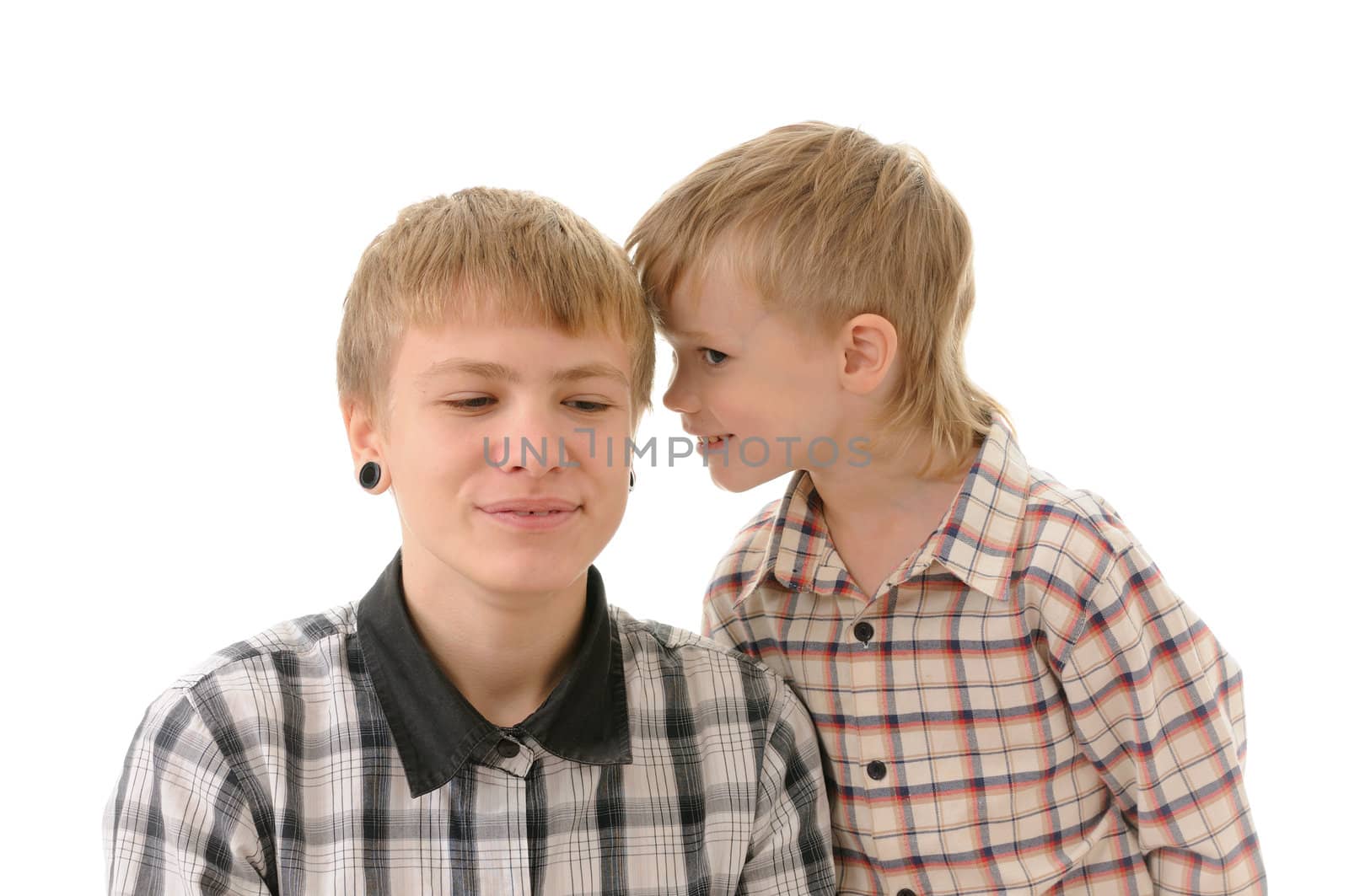 Two brothers embrace isolated on white background