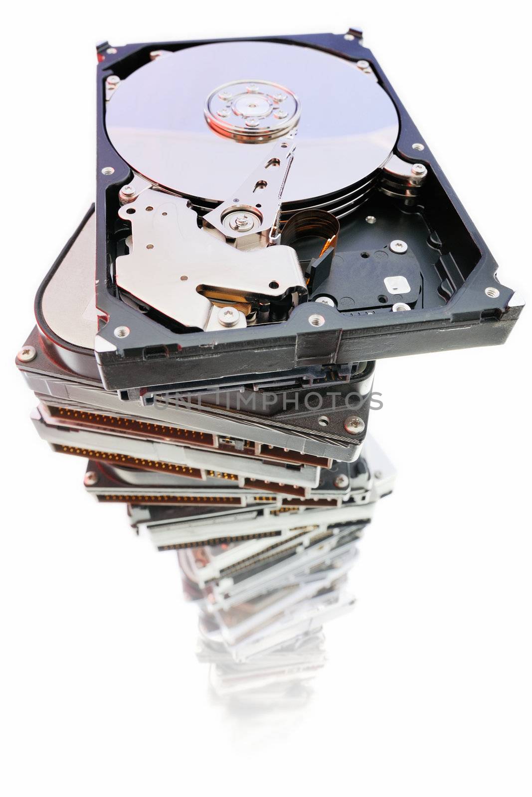 Stack of hard drives on the white background