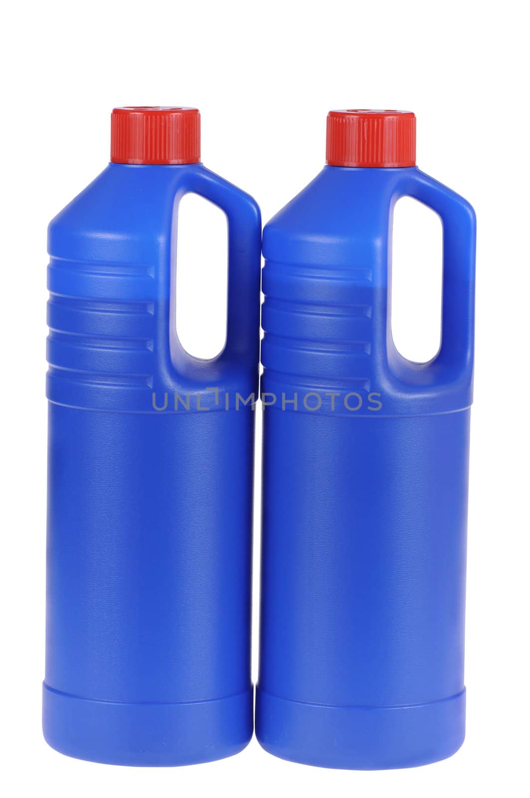 Plastic dark blue bottles isolated on a white background