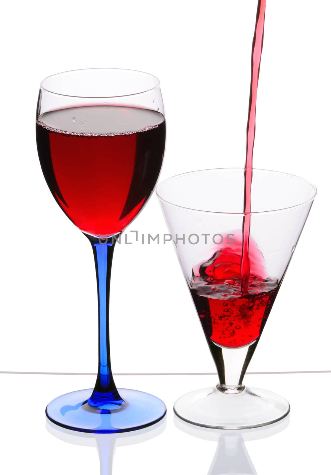 Wineglass with red wine isolated on white background