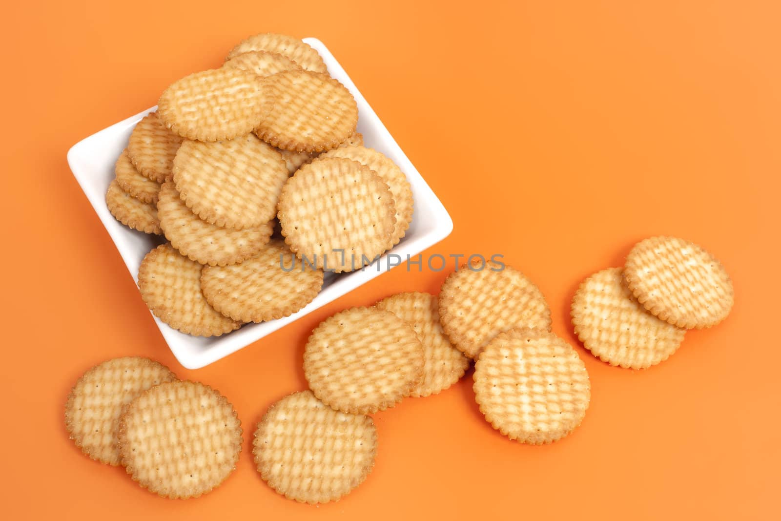 An image of some nice cracker on orange background