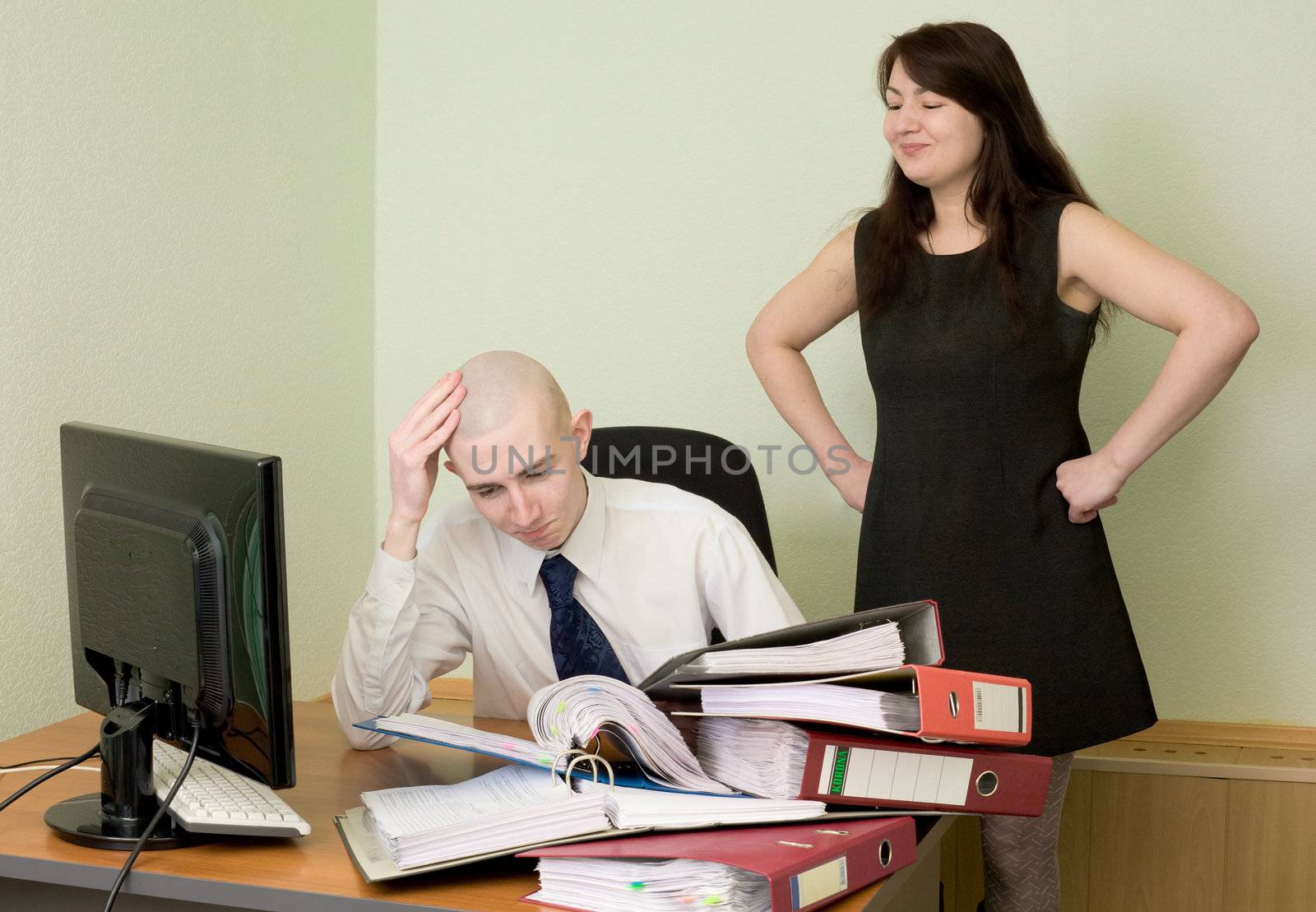 The bookkeeper and the secretary on a workplace at office