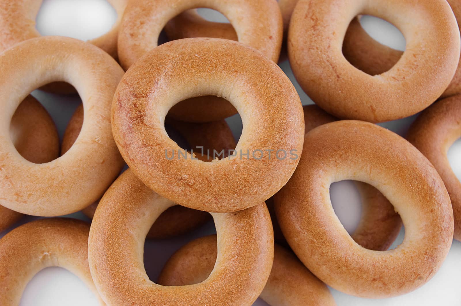 Pile of ring bagels as background