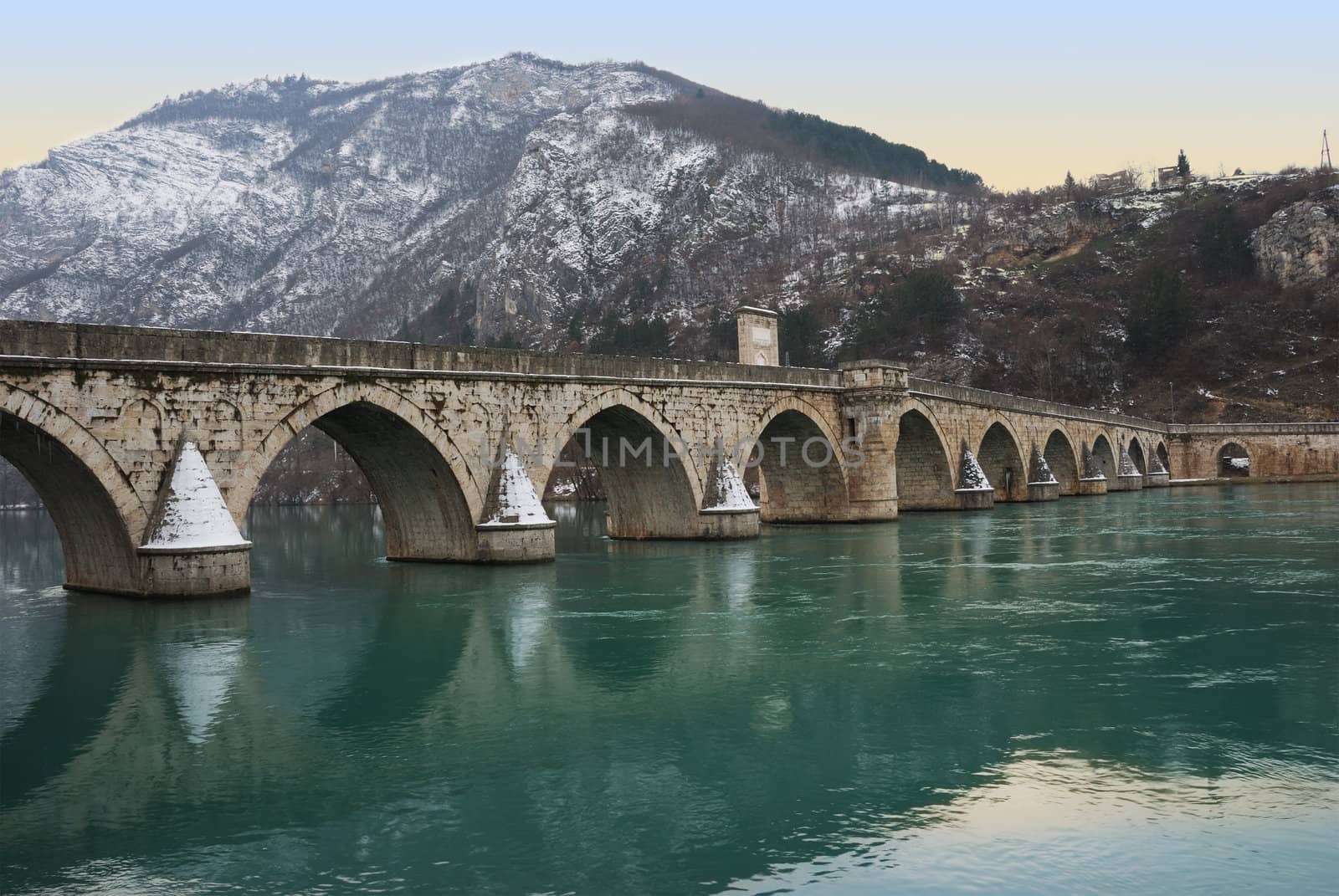 The bridge on the Drina in Visegrad in Bosnia and Herzegovina in twilight.