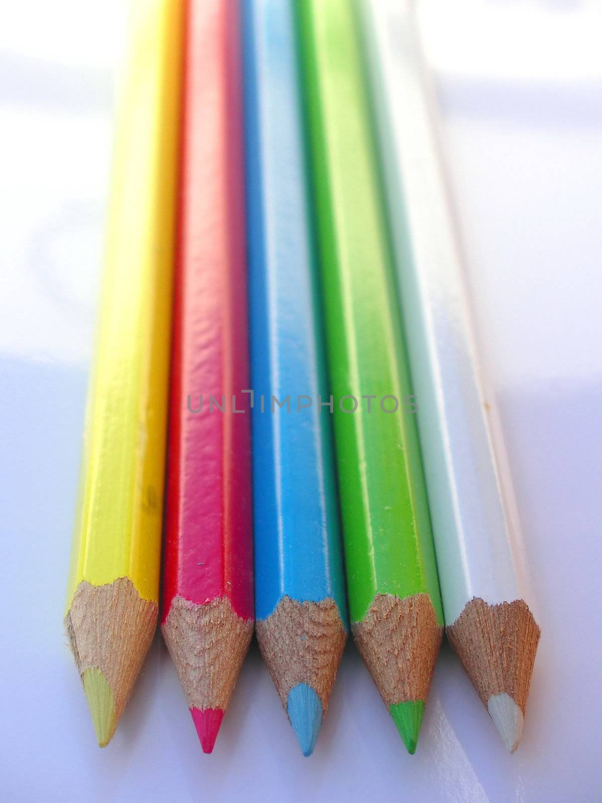 five long pencil crayons