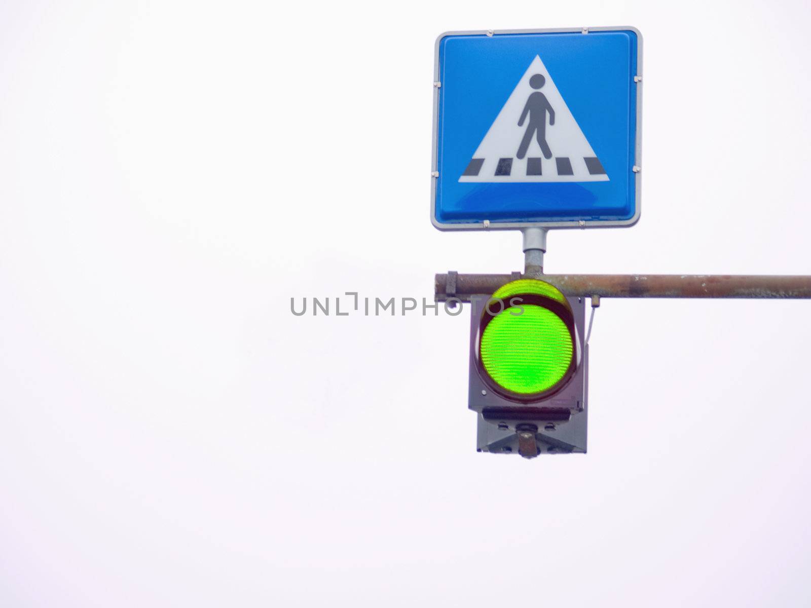 Go light showing green at a pedestrian  crossing