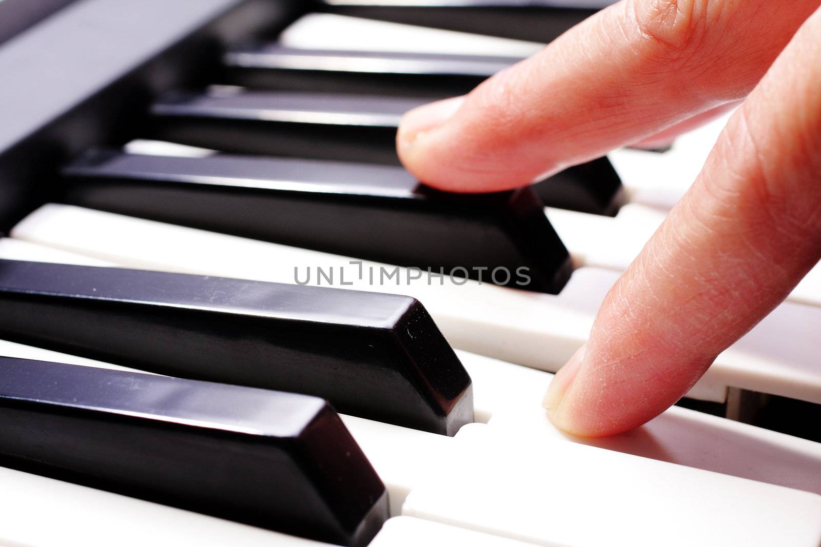 hands playing music on the piano, hands and piano player, keyboard .