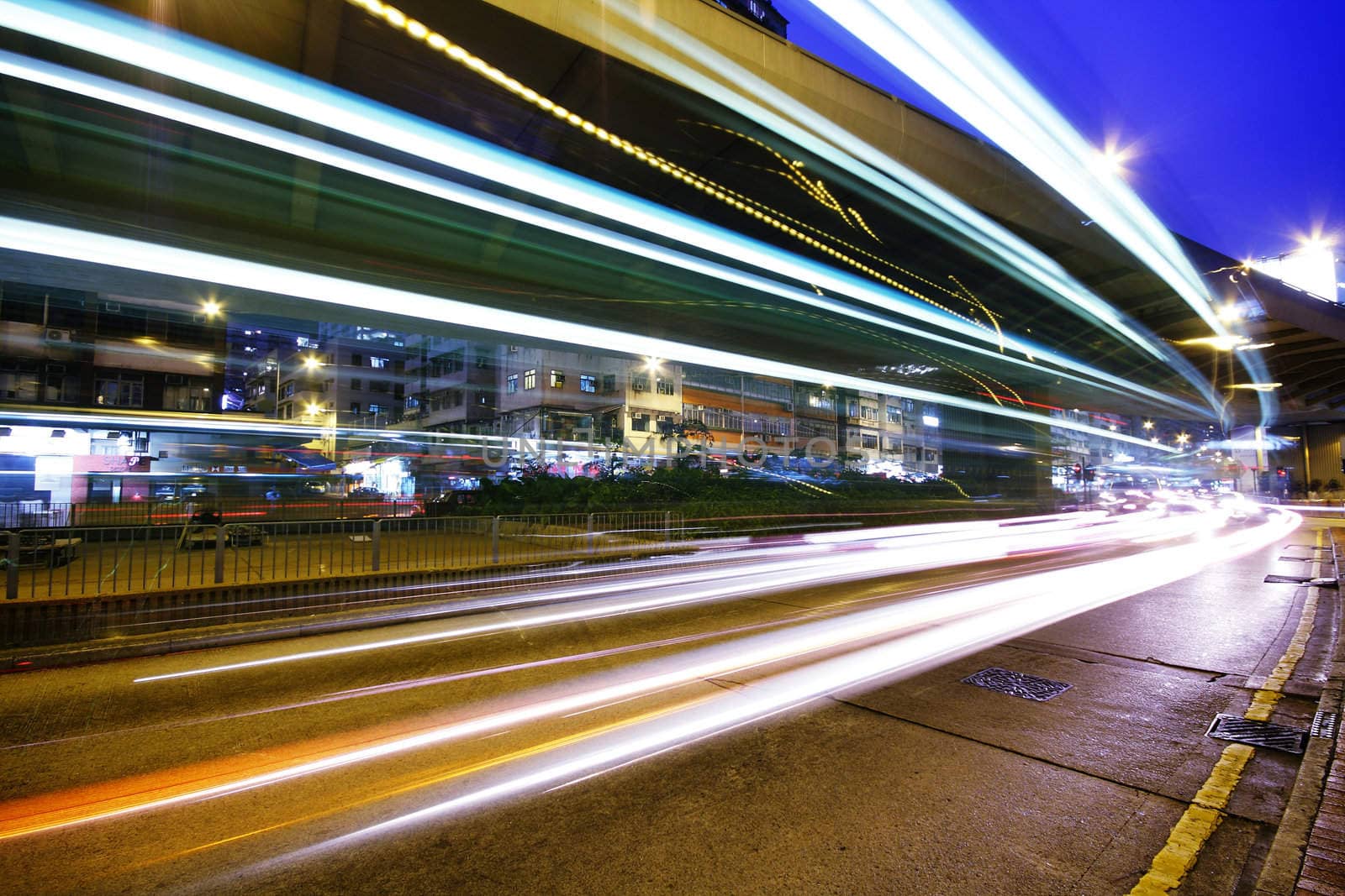 High traffic street in a rush-hour at night .