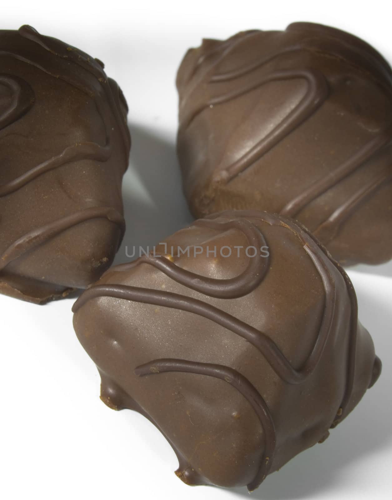 3 Sweet chocolate, a photo close up on a white background