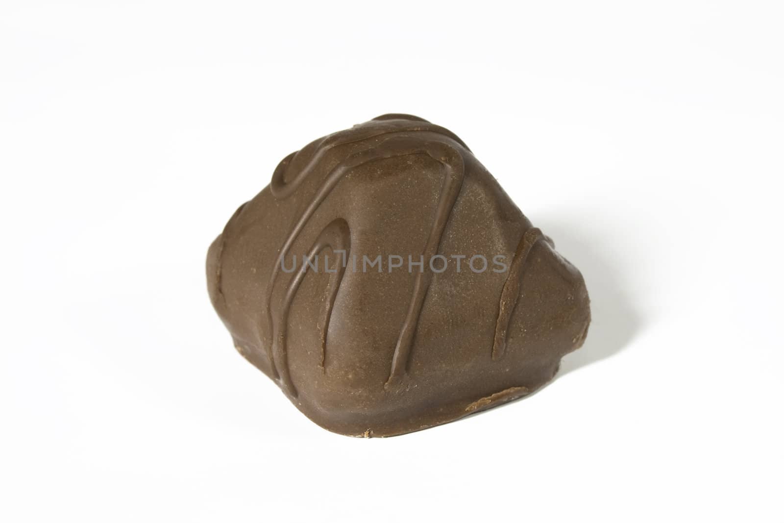 Sweet chocolate, a photo close up on a white background